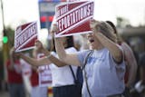 Mary Breen chanted with around 70 other protestors during a MIRAC protest in response to immigration raids in southern Minnesota outside the Minnesota GOP head quarters in Minneapolis, Minn., on August 9, 2018.