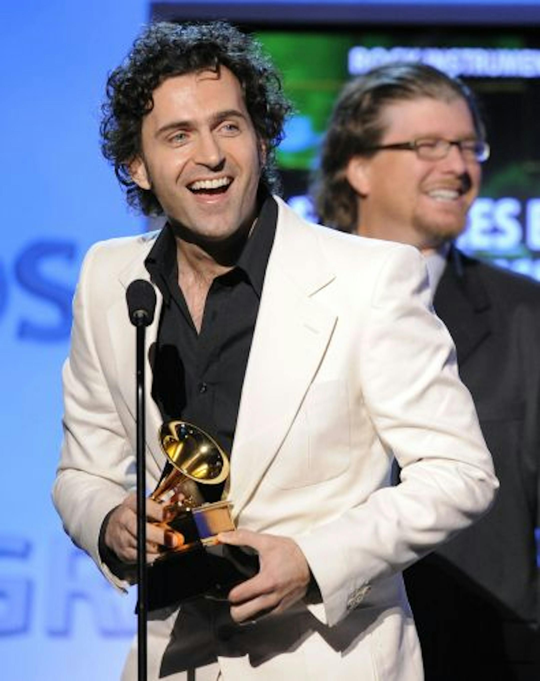 Dweezil Zappa accepts the award for best rock instrumental performance, for Peaches in Regalia, at the 51st Annual Grammy Awards on Sunday, Feb. 8, 2009, in Los Angeles.