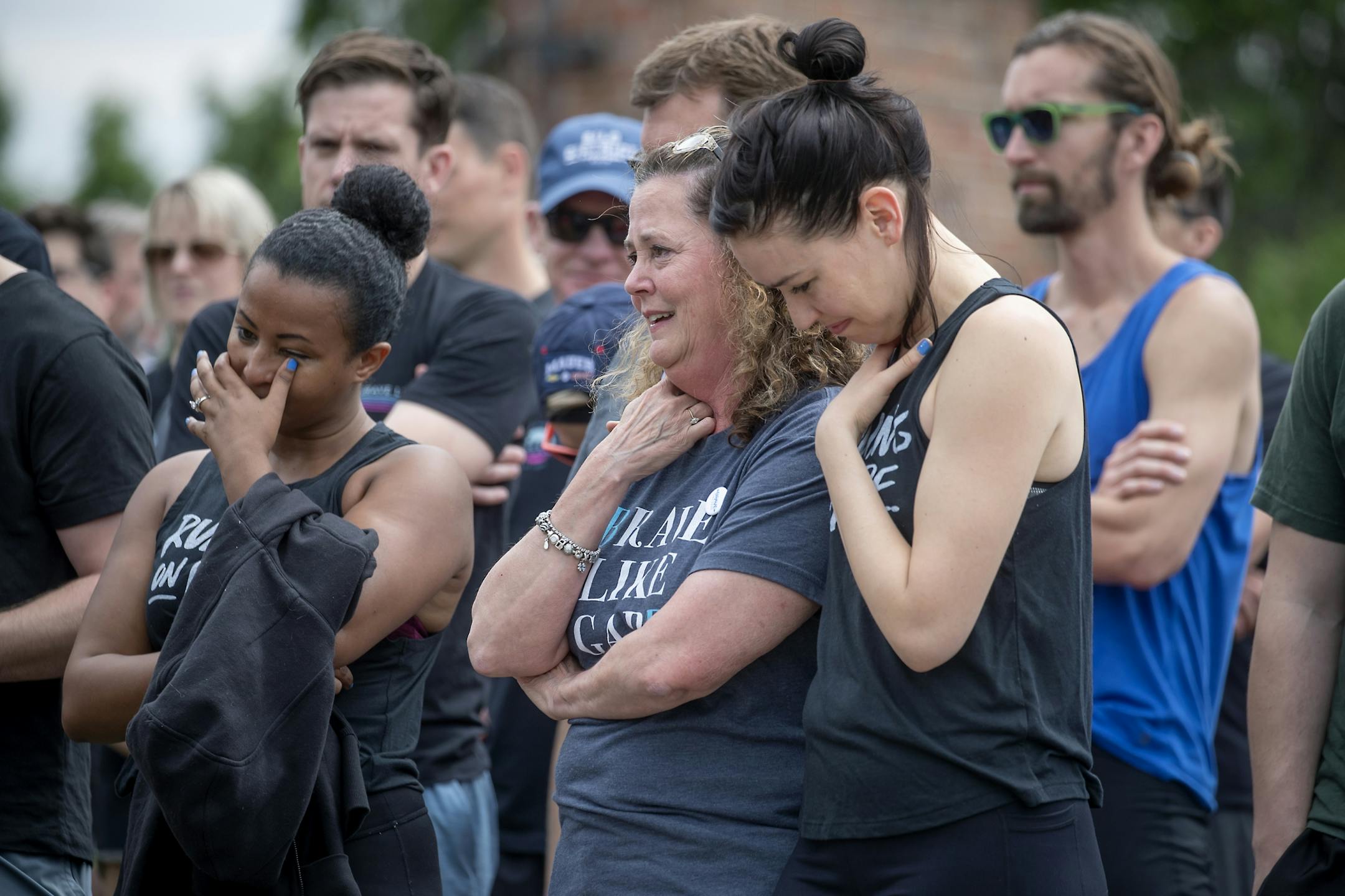 After Gabriele Grunewald's burial, family, friends, and supporters gathered for a song and a one-mile run/jog/walk to honor Gabriele just outside Hillside Cemetery in Minneapolis.