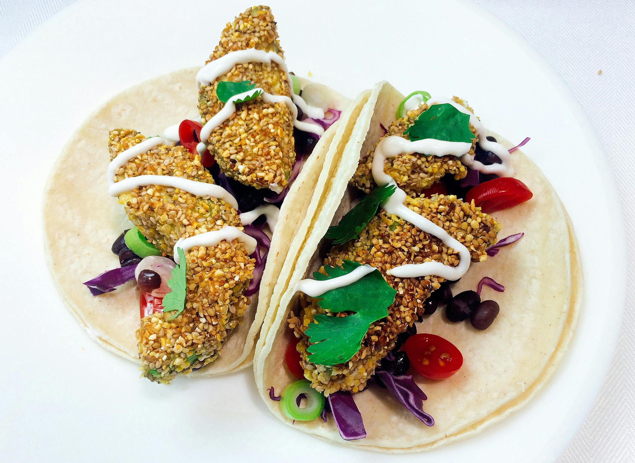 Robin Asbell, Special to the Star Tribune Crunchy Avocado Tacos With Black Beans and Cabbage
