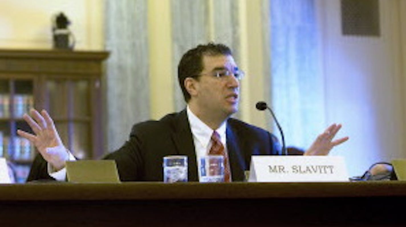 (NYT30) WASHINGTON -- March 31, 2009 -- CONGRESS-HEALTH-INSURANCE-3 -- From left, Stephen J. Hemsley, the chief executive of UnitedHealth Group, and Andy M. Slavitt, who heads UnitedHealth&#xcc;s database business, Ingenix, appear before the Senate commerce committee in Washington on Tuesday, March 31, 2009. The panel is weighing evidence that health insurers had routinely underpaid their customers for out-of-network medical care. (Stephen Crowley/The New York Times)