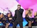 Pitbull performed with visual and video accompaniment at the Las Vegas stop on his fall tour with Enrique Iglesias/ AP Photo/Las Vegas News Bureau, Gl