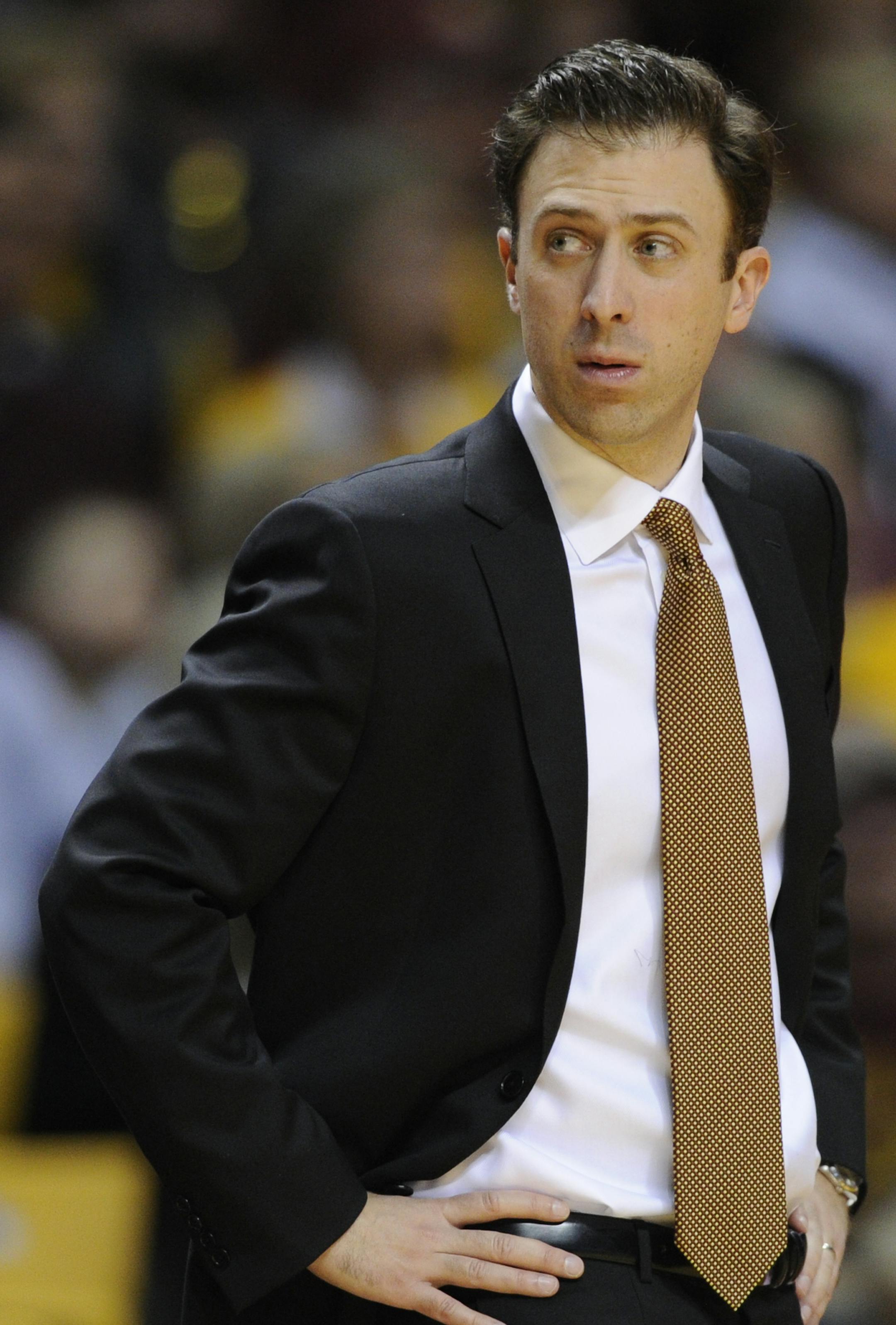 Minnesota head coach Richard Pitino watches his team play against Penn State during the first half of an NCAA college basketball game Sunday, March 8, 2015, in Minneapolis. Penn State won 79-76. (AP Photo/Hannah Foslien) ORG XMIT: MIN2015040919323080