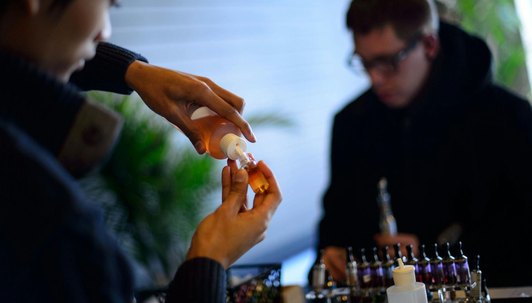 Ny poured some e-juice for a customer at the Uptown Vapor Shoppe.