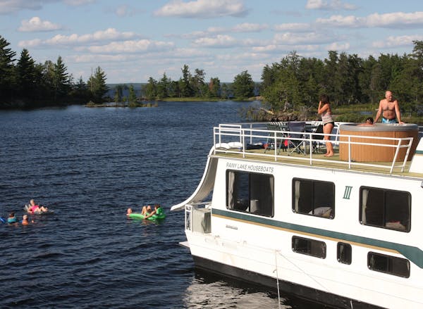 Houseboat trip to Voyageurs included water in Rainy Lake or the hot tub on the top deck.