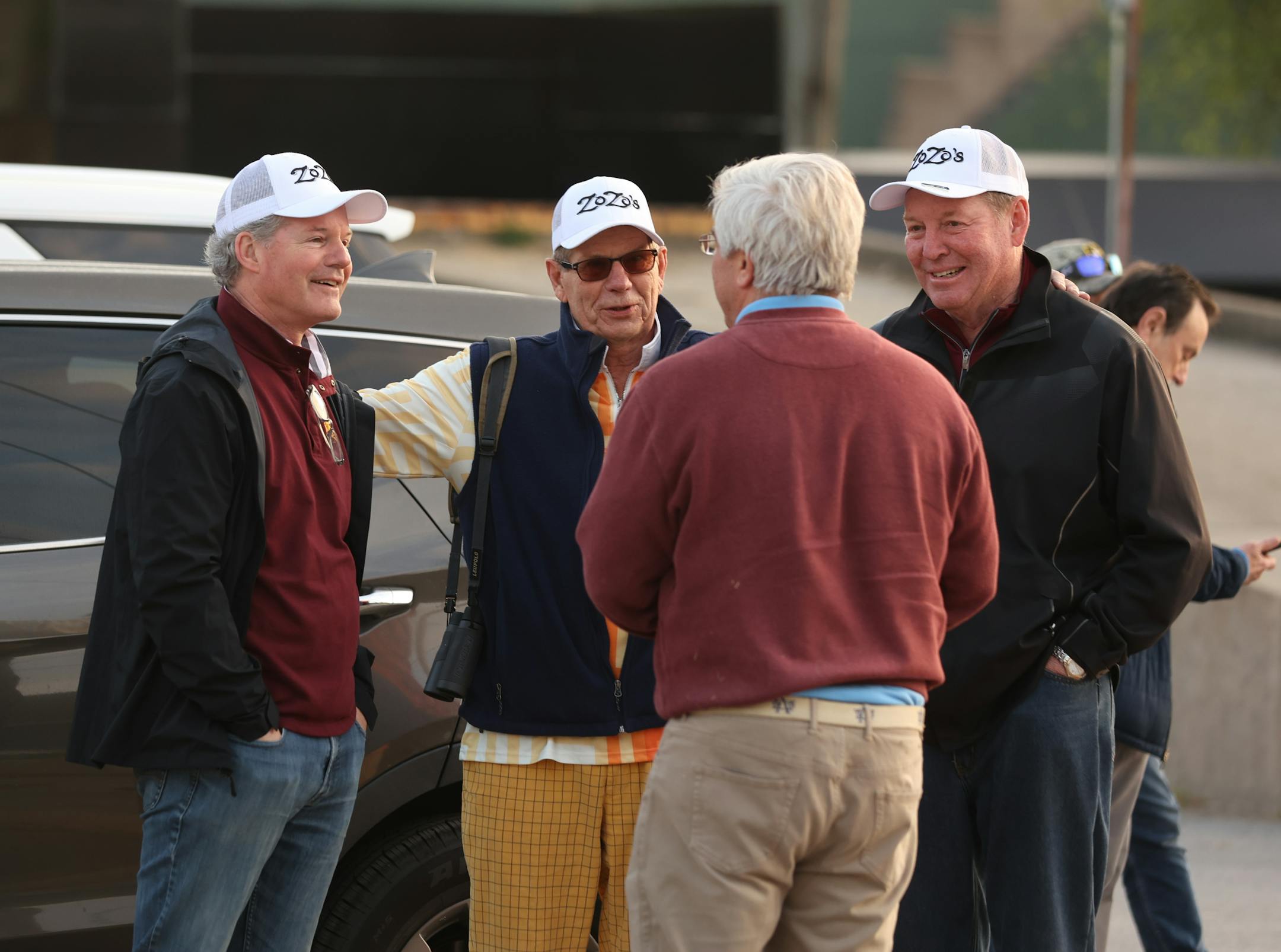 Zozos fans chat at Churchill Downs.