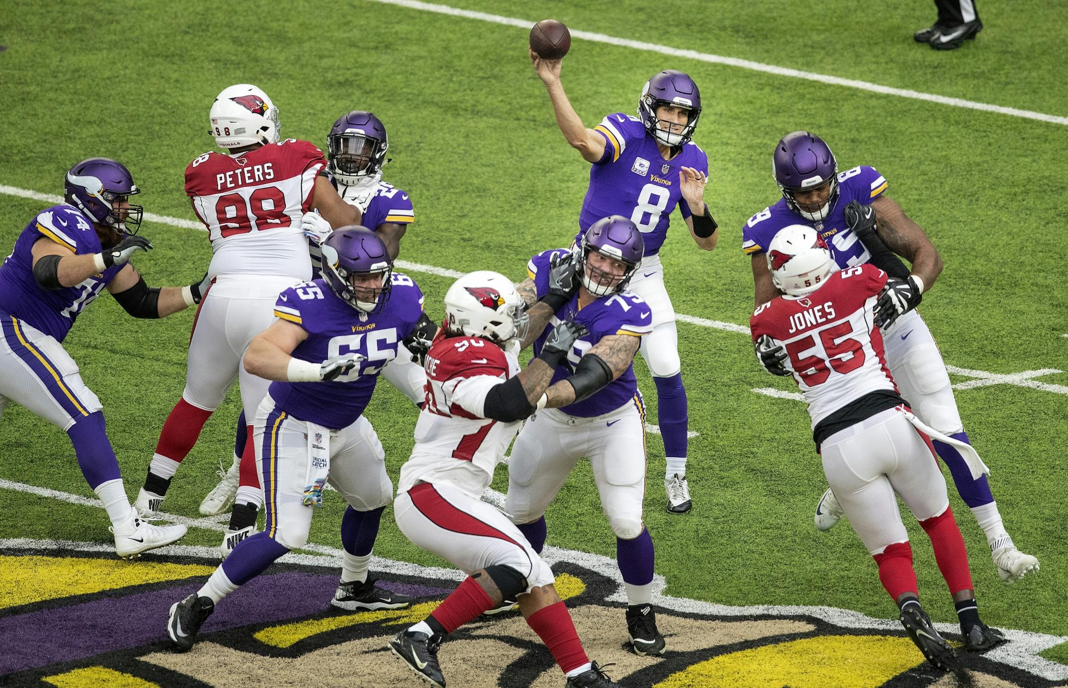 Minnesota Vikings quarterback Kirk Cousins attempted a pass in the first quarter.