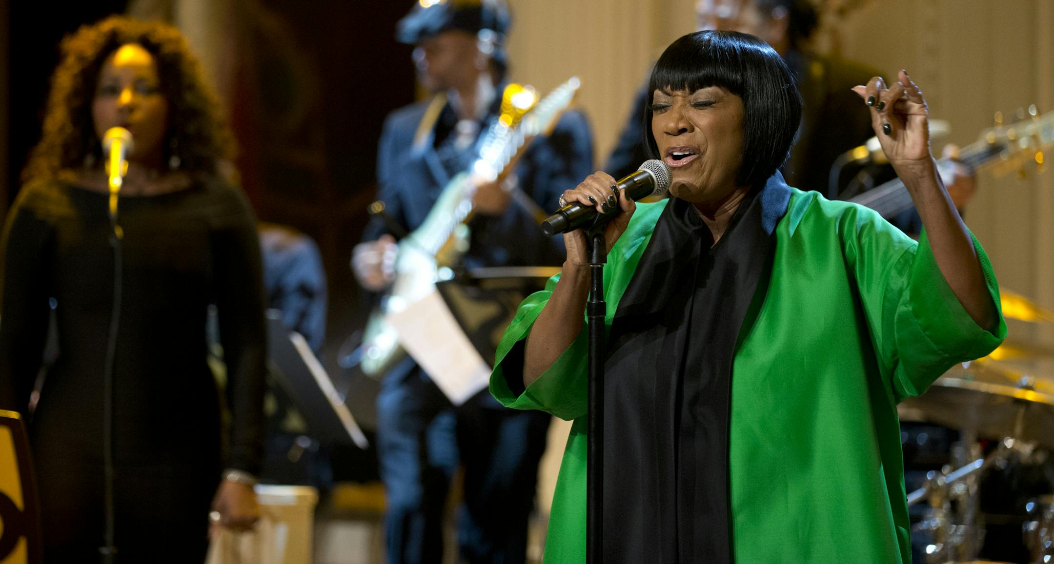 Patti LaBelle sings "Over the Rainbow" during the "In Performance at the White House: Women of Soul" in the East Room of the White House in Washington, Thursday, March 6, 2014, hosted by President Barack Obama and first lady Michelle Obama. The program include performances by Tessanne Chin, Melissa Etheridge, Aretha Franklin, Ariana Grande, Janelle Mon·e and Jill Scott. (AP Photo/Manuel Balce Ceneta)