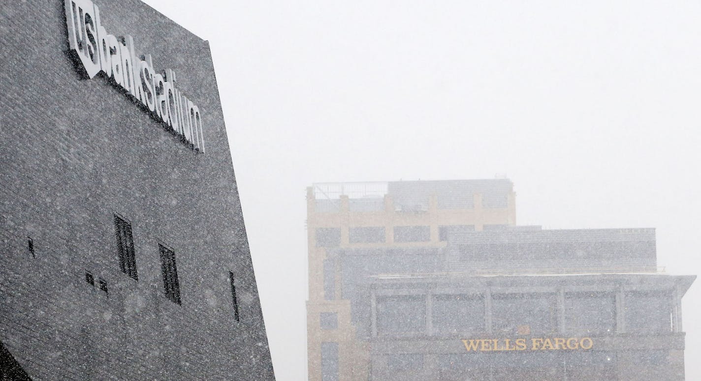 The U.S. Bank Stadium with the signage from the Wells Fargo towers to the north, seen from 11th Avenue S. on Dec. 23.