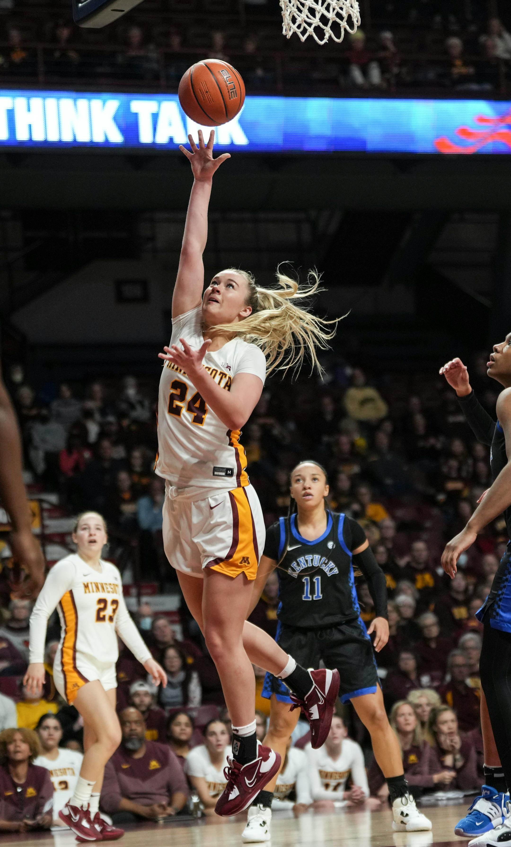 Minnesota Gophers forward Mallory Heyer (24) scores in the second half.