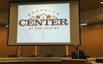 City Manager Curt Boganey and Brooklyn Center's new city logo.
