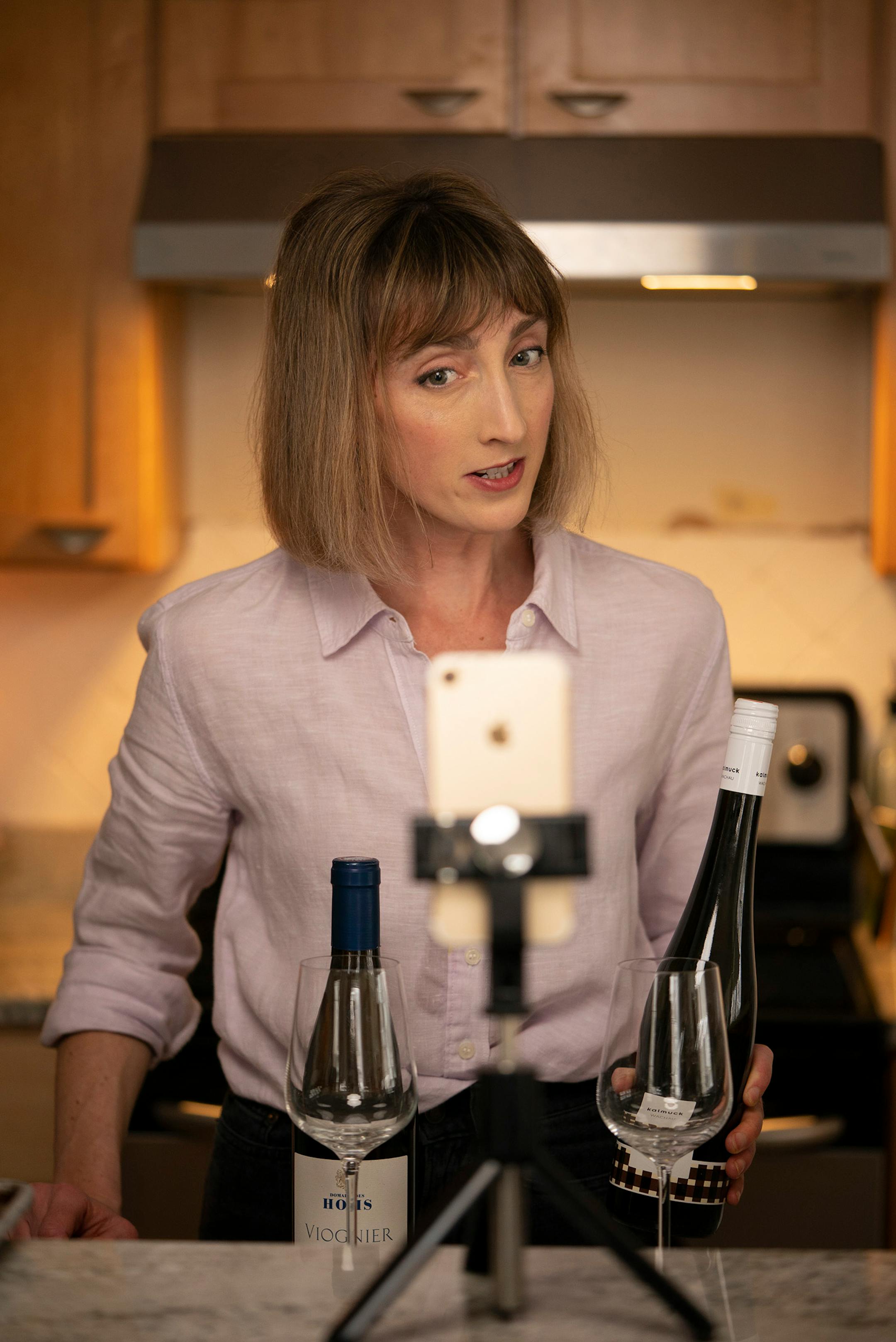 Chef Karyn Tomlinson addressed the camera while talking about the wines she will pair with the two soups she was showing how to make. Since the pandemic began, former Corner Table chef Karyn Tomlinson has been a prolific poster to Instagram, offering free cooking lessons with her show "Karyn's Quarantine Kitchen." She was photographed producing a segment on preparing pureed soups Thursday afternoon, April 23, 2020 in the kitchen of her condo.