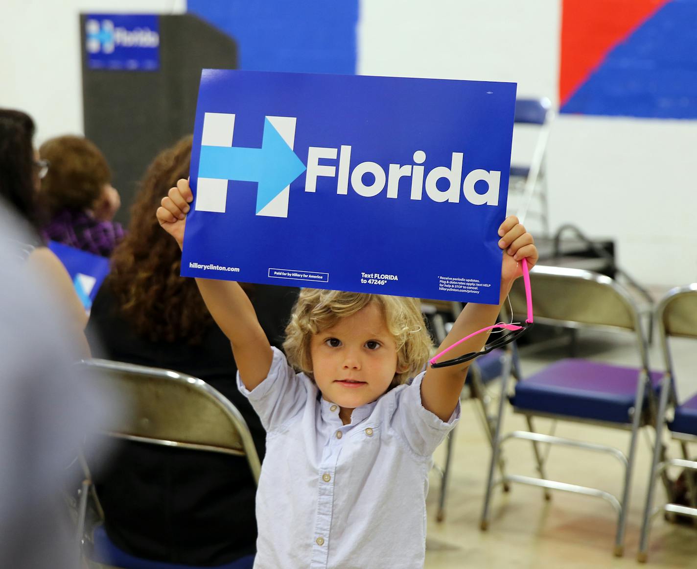 Etienne Lara, 5, is among hundreds of supporters of Democratic presidential candidate Hillary Clinton that attended a rally at the campaign's Miami field office in the city's Wynwood neighborhood, on Saturday, July 9, 2016. (Pedro Portal/Miami Herald/TNS)