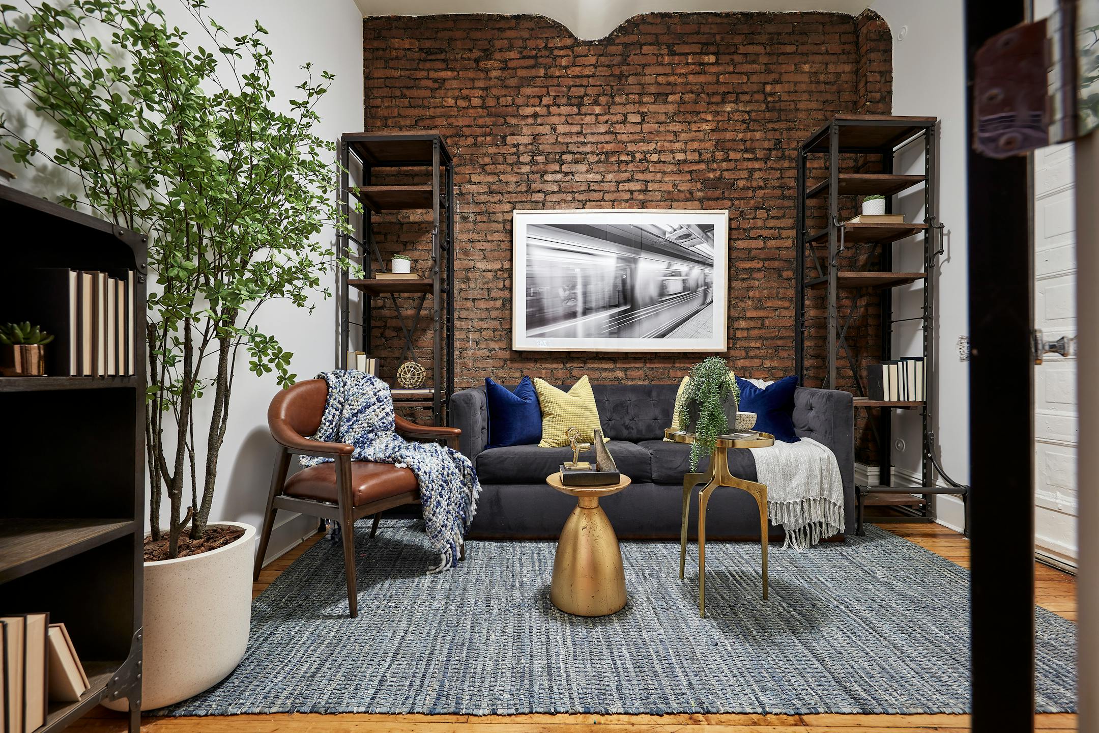 An industrial styled space serves as an office and den in an urban apartment. (Scott Gabriel Morris/TNS)