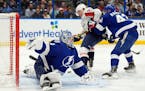 Tampa Bay Lightning goaltender Andrei Vasilevskiy made a save on Washington Capitals right wing T.J. Oshie during the first period Thursday. Oshie lat