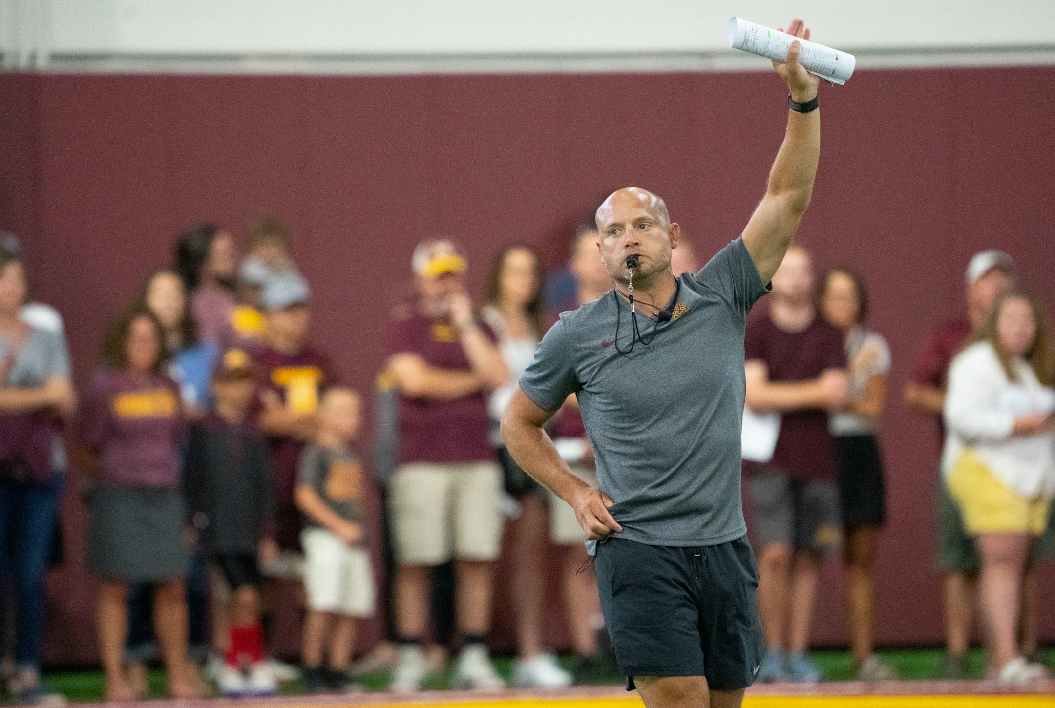 Gophers football head coach P.J. Fleck blows his whistle during the football team's open practice Saturday.