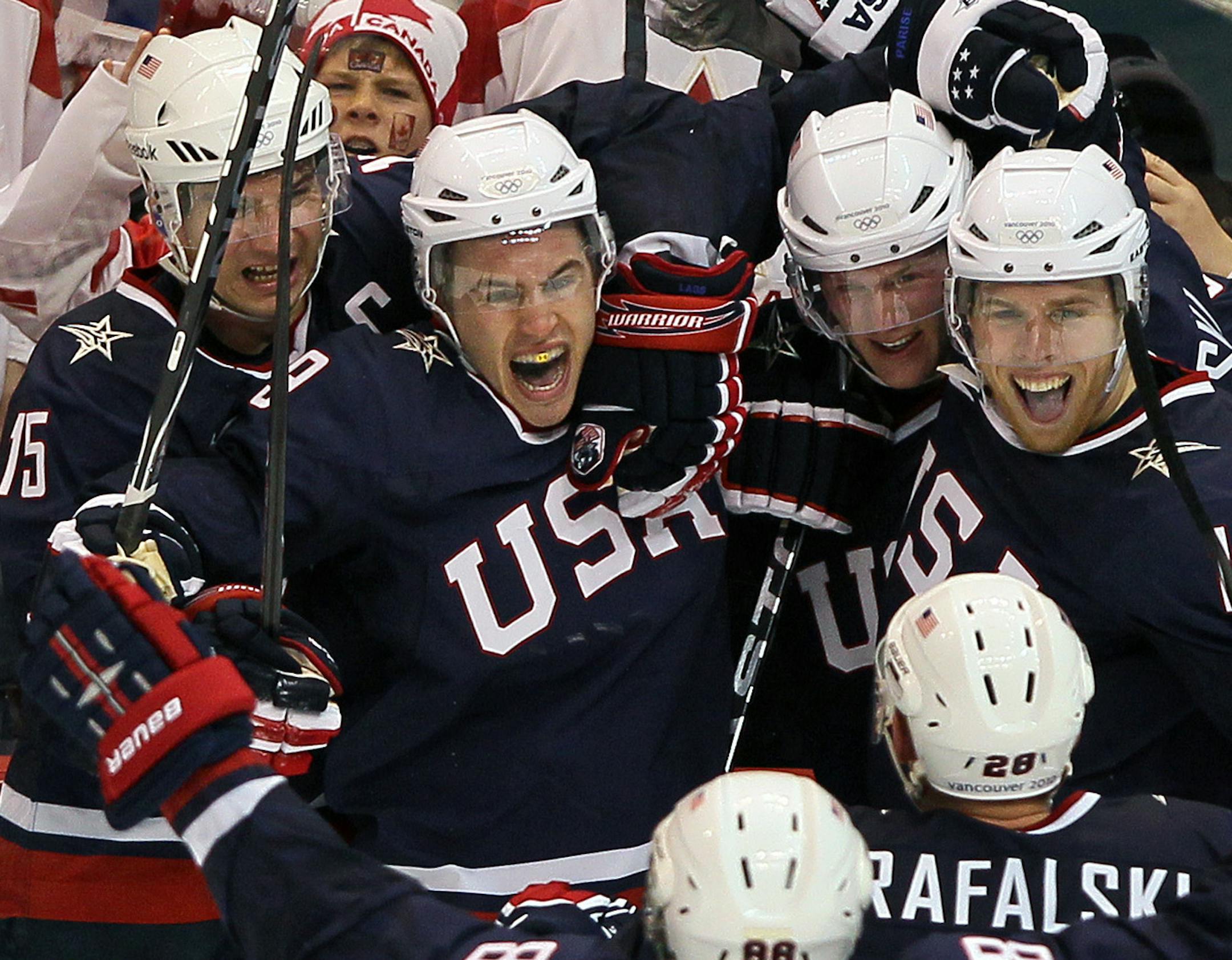 BRIAN PETERSON • brianp@startribune.com Vancouver, BC - 02/28/2010 - ] Hockey Men's Gold Medal Game - USA -vs- CANADA. (in this photo)Team USA celebrates a Zach Parise (center) goal to tie the game with just seconds left in the 3rd period.