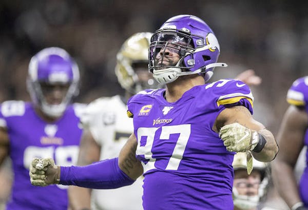The Minnesota Vikings' Everson Griffen (97) celebrates a play against the New Orleans Saints on January 5, 2020, in New Orleans. The veteran defensive