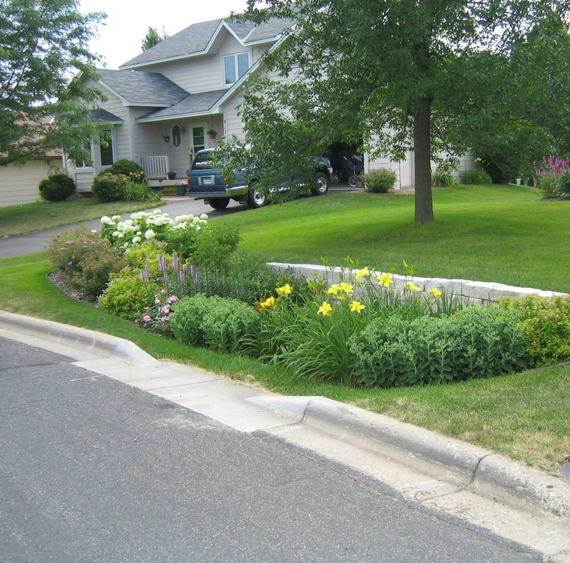 Photo courtesy of Minnehaha Creek Watershed District: An example of a residential rain garden in the west metro.
