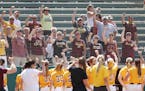 Gopher team celebrated with their fans after a win gainst the Louisiana Tech catcher during the regional