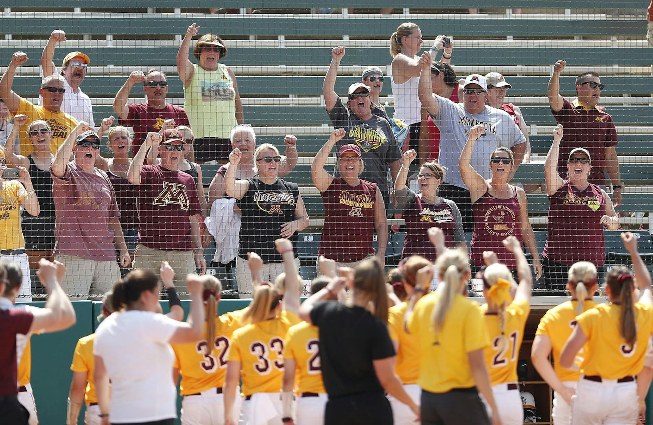 Gopher team celebrated with their fans after a win gainst the Louisiana Tech catcher during the regional