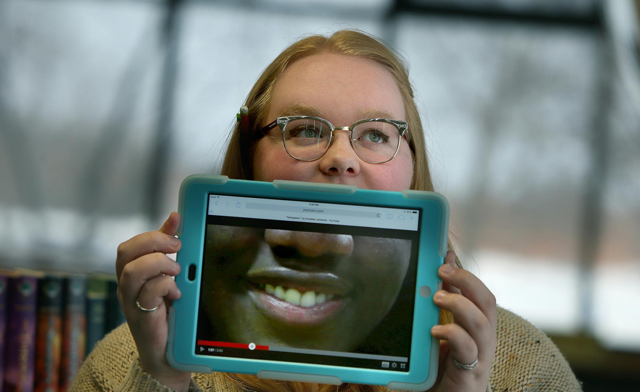 Annilese Lamberty showed off a portion of her short film at Champlin Park High School, Tuesday, March 5, 2014. Lamberty has won national honors in a Harvard short film contest called Girls Impact the World Film Festival. She was one of six national finalists. Her film features minority female classmates talking about beauty. ] (ELIZABETH FLORES/STAR TRIBUNE) ELIZABETH FLORES • eflores@startribune.com