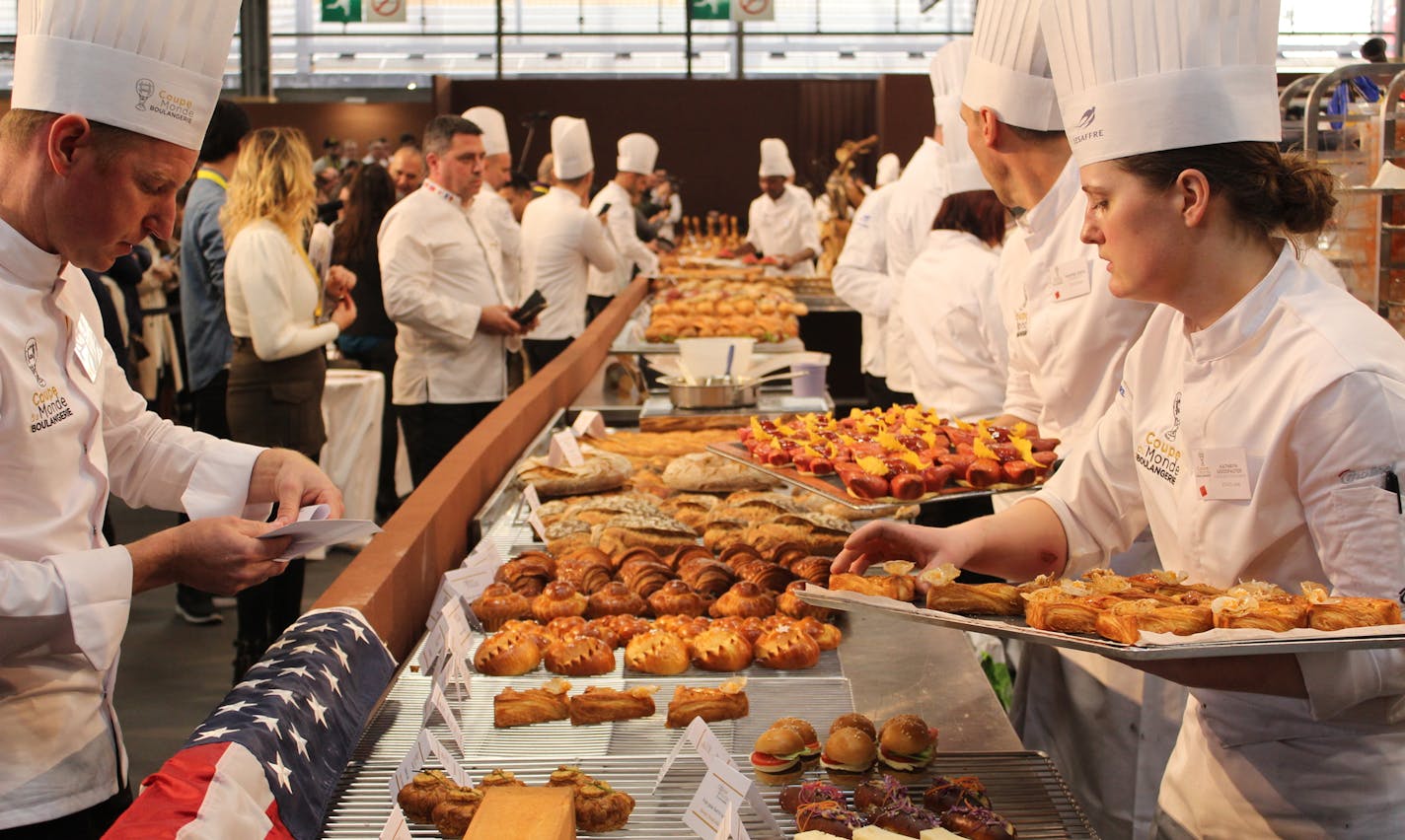 Twin Cities baker Kathryn Goodpaster, right, assembled her creations for judging at the Coupe du Monde de la Boulangerie in Paris on Jan. 11.