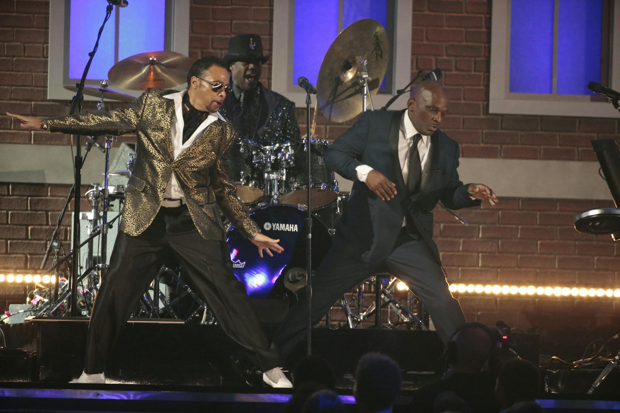 Morris Day and the Time with Jerome perform in a tribute to Prince during the 59th Annual Grammy Awards.