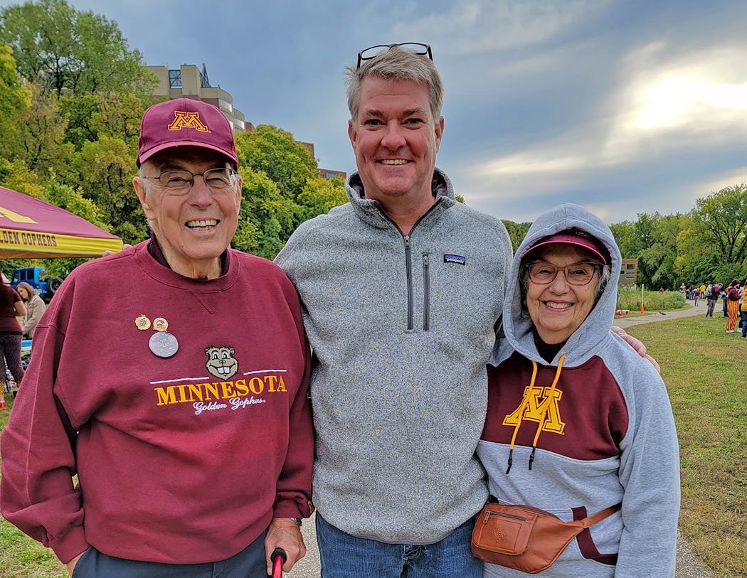 Here I am with Dick and Delores Olson, who graduated from Minnesota in 1958 and are still waiting for a Rose Bowl promise to come true.