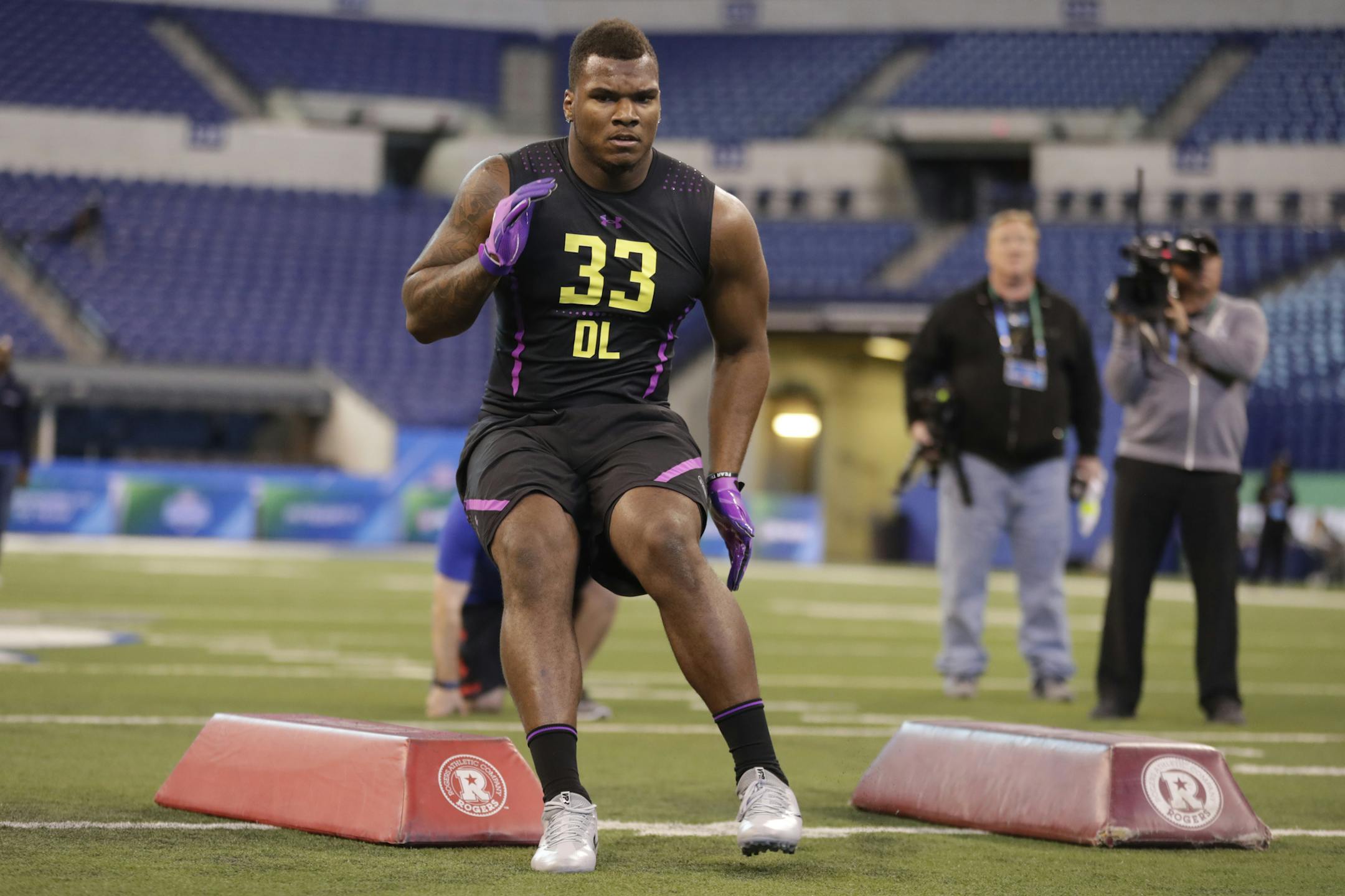Stephen F Austin defensive lineman John Franklin-Myers runs a drill at the NFL football scouting combine in Indianapolis, Sunday, March 4, 2018. (AP Photo/Michael Conroy) ORG XMIT: INMC10