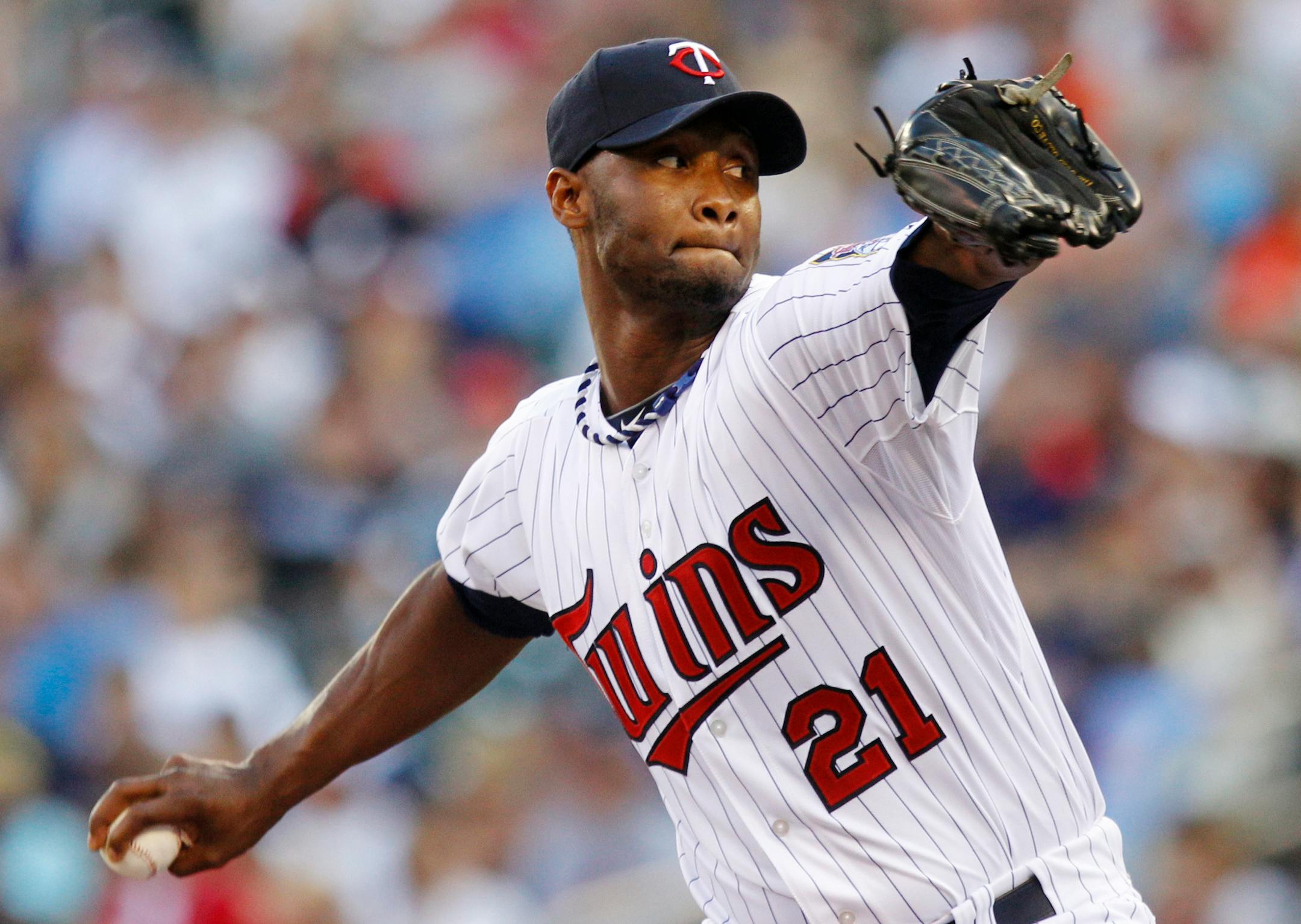 Twins starting pitcher Samuel Deduno throws against the Kansas City Royals during the first inning of a game on Thursday, June 27, 2013, in Minneapolis.
