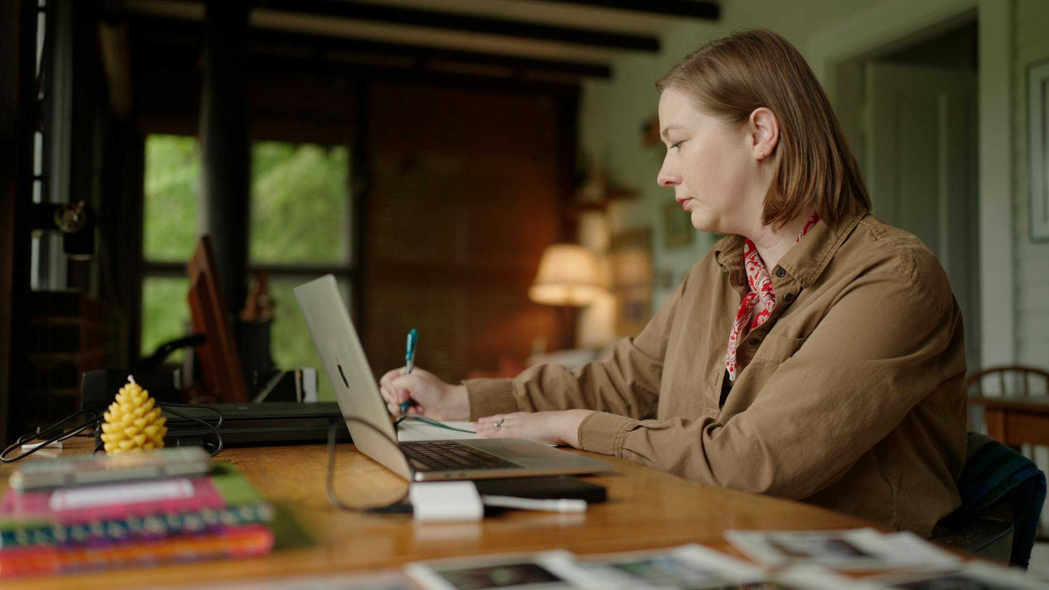 Haley Prochnow works inside the Science Museum of Minnesota’s Pine Needles cabin