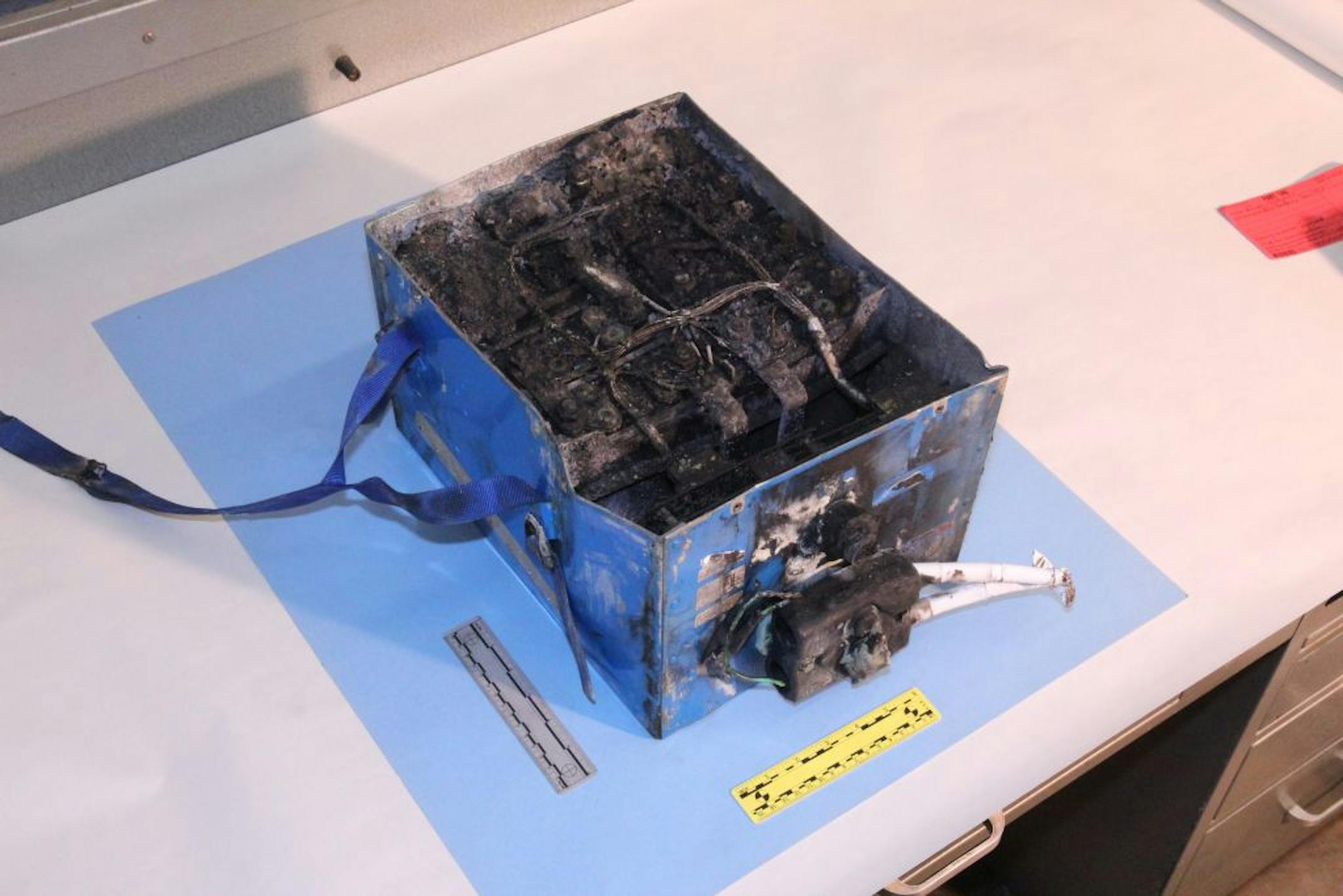 This undated photo provided by the National Transportation Safety Board shows the burned auxiliary power unit battery from a JAL Boeing 787 that caught fire on Jan. 7, 2013, at Boston's Logan International Airport. It�s been nearly a quarter of a century since the last big jump in battery technology. As 21st century technology strains to be ever faster, cleaner and cheaper, the battery, an invention from more than 200 years ago keeps holding it back. It's why electric cars aren't clogging the ro