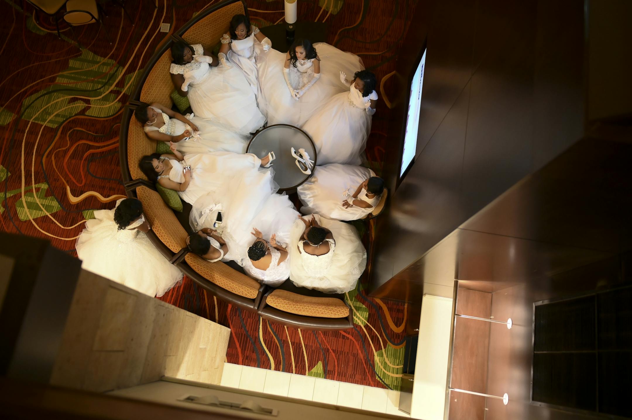 The debutantes waited for the start of their winter cotillion Saturday night in the hotel lobby.