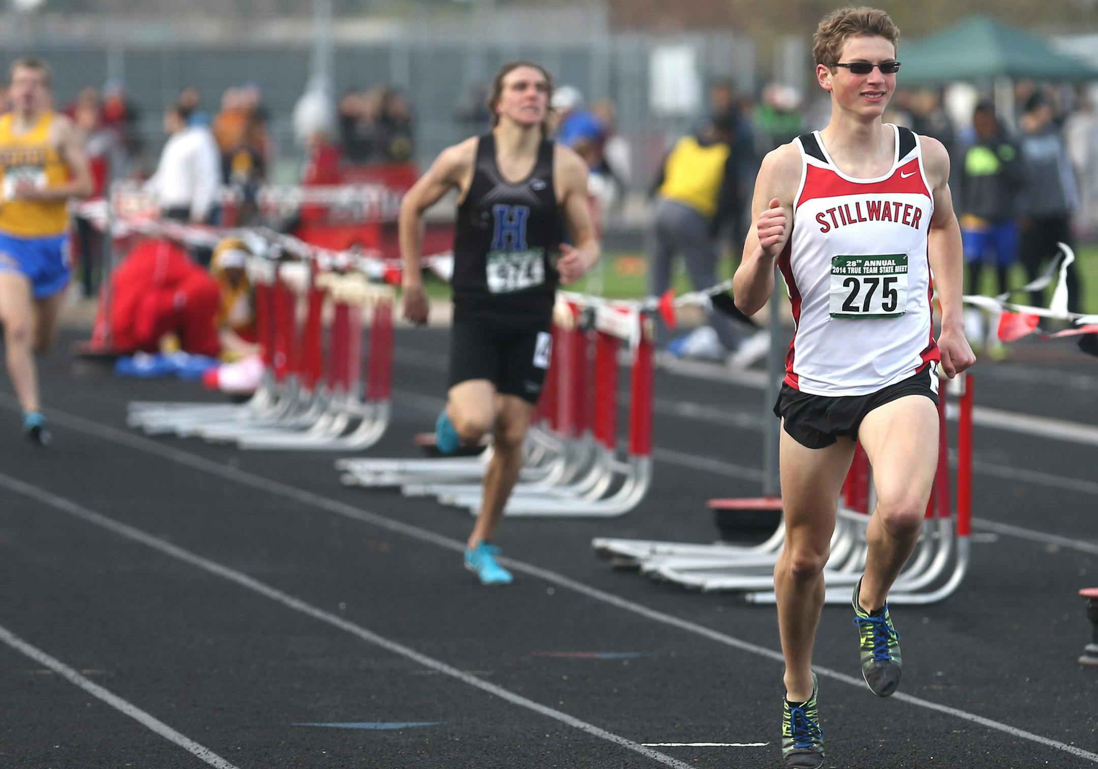 Eli Krahn, of Stillwater, ran toward the finish line i nthe 1600 meters. ] (KYNDELL HARKNESS/STAR TRIBUNE) kyndell.harkness@startribune.com During the True Team track meet in Stillwater, Min. Friday, May 16, 2014.