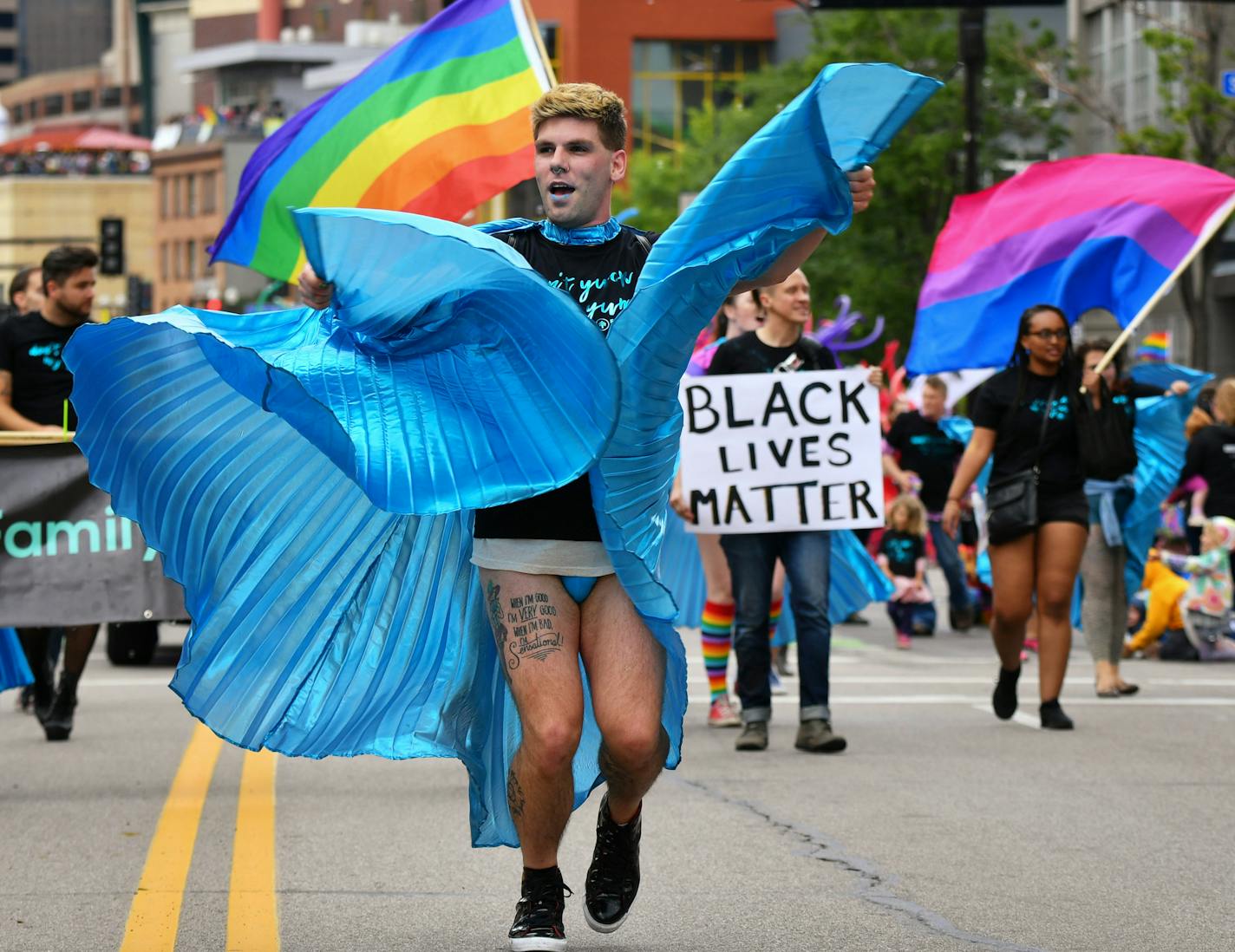 Brandon Waters led the Family Tree Clinic group down Hennepin Avenue. Sunday June 25, 2017 Coverage of annual Twin Cities Gay Pride Parade. Goes down Hennepin. News things to watch for are the aftermath of the cops being disinvited from marching (as of this writing, the parade organizers still hadn&#x2019;t reversed their decision. If they do, that will be good to get shots of the police contingent in the parade). Plus, is the parade much more political than in past years, because of Trump presi