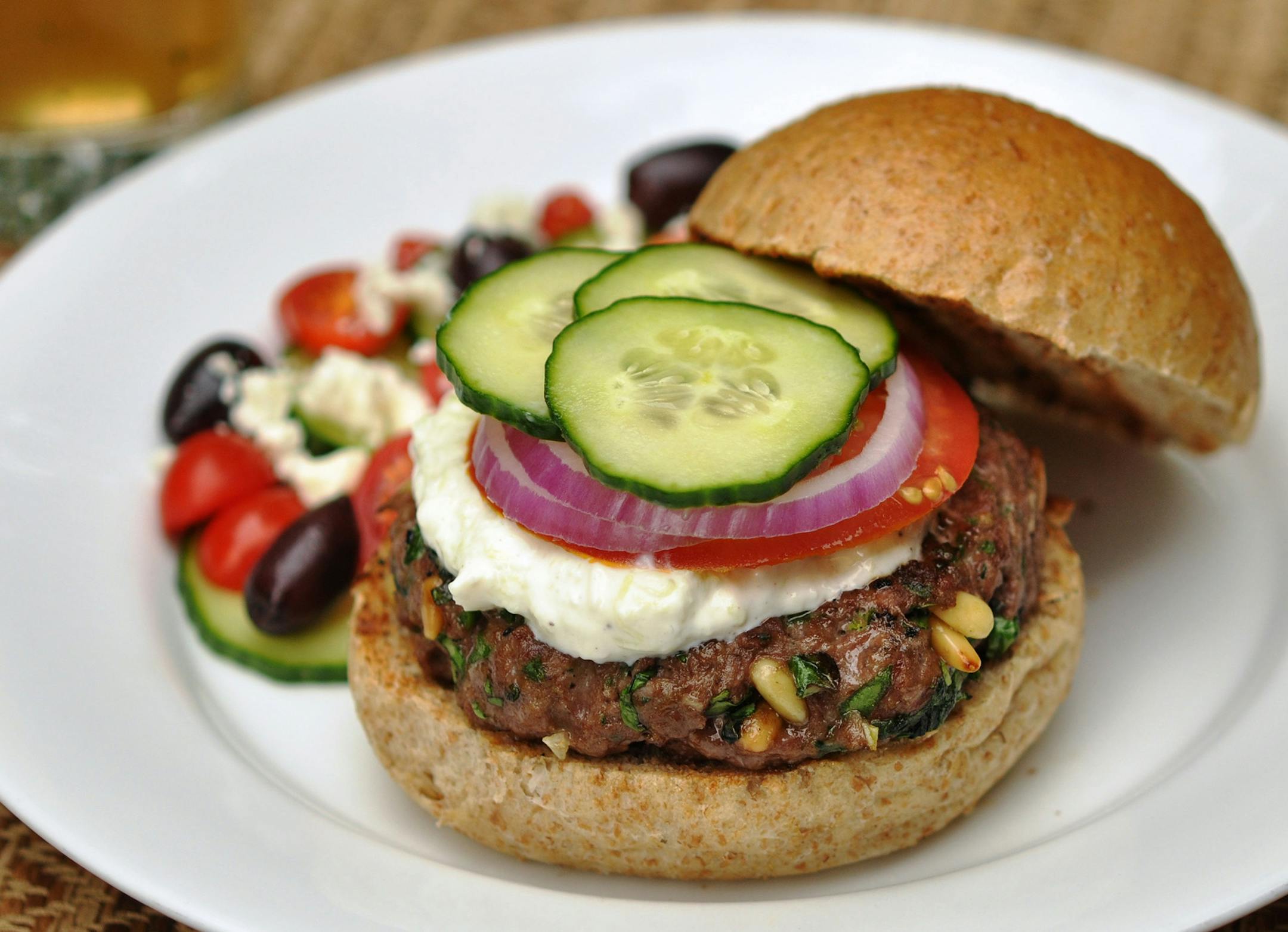 Meredith Deeds, Special to the Star Tribune Greek Burgers with Feta-Cucumber Yogurt Sauce