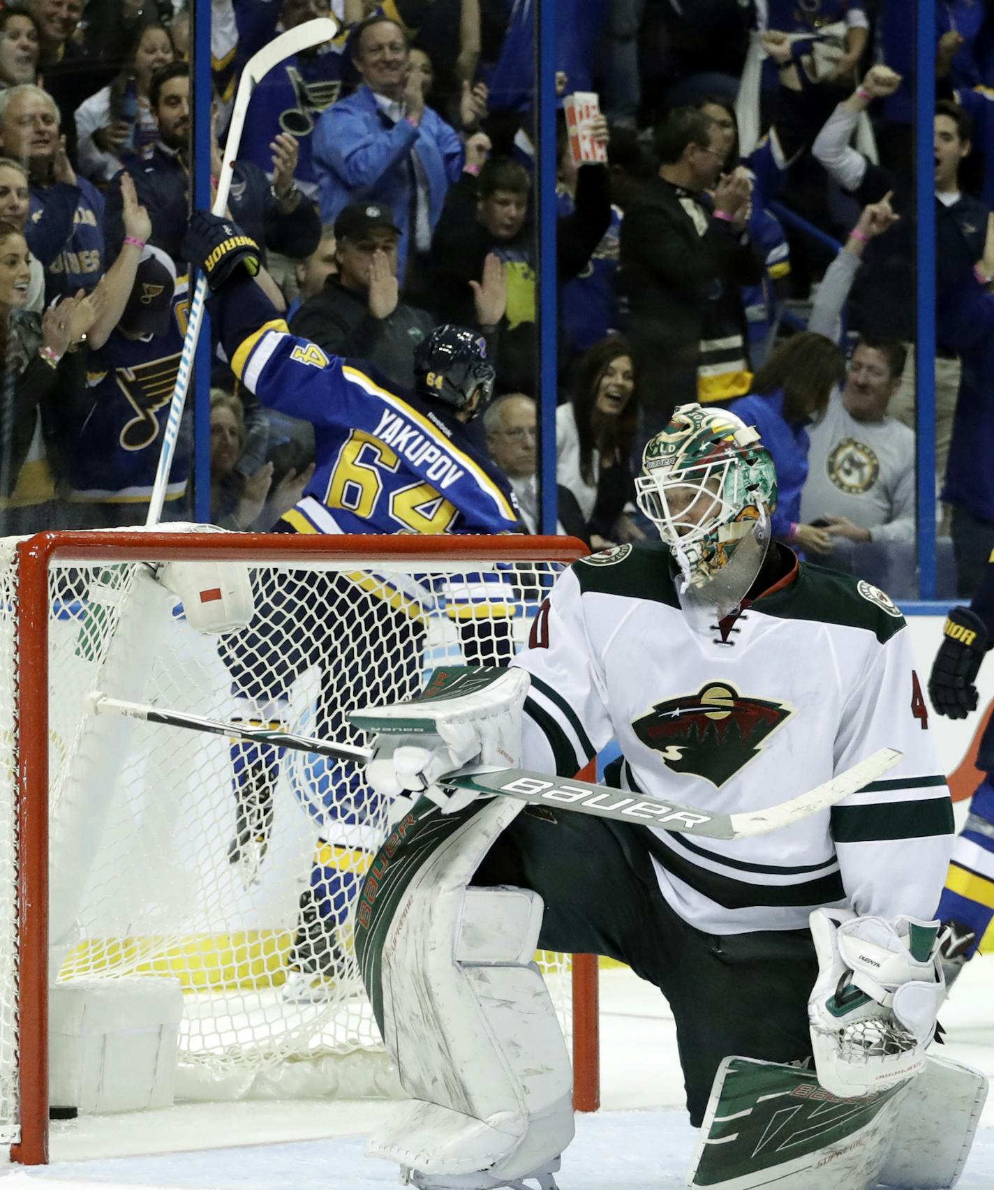 St. Louis Blues's Nail Yakupov (64), of Russia, celebrates after scoring past Minnesota Wild goalie Devan Dubnyk during the second period of an NHL hockey game Thursday, Oct. 13, 2016, in St. Louis. (AP Photo/Jeff Roberson)