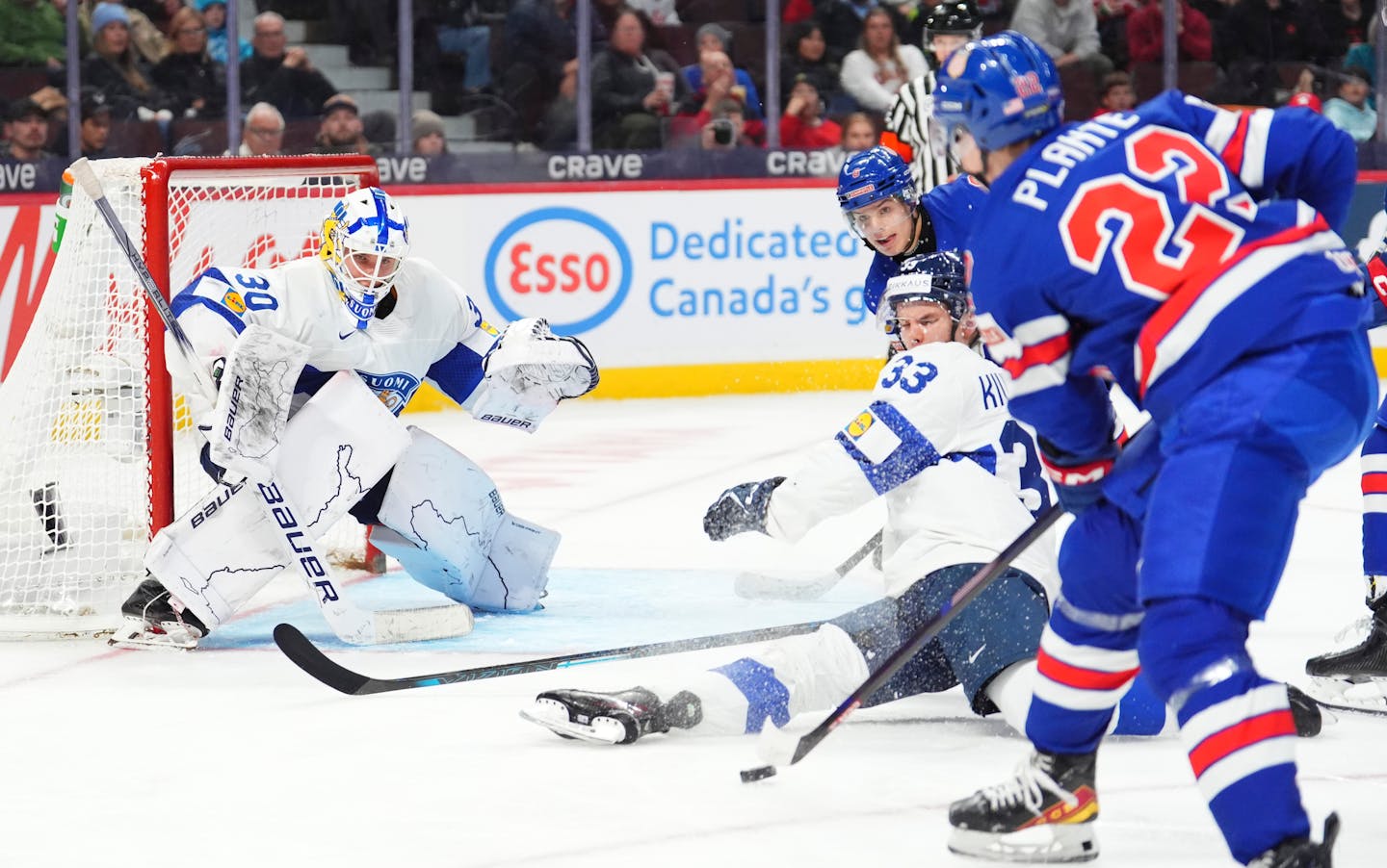 United States repeats as world junior hockey champion, defeating Finland in overtime