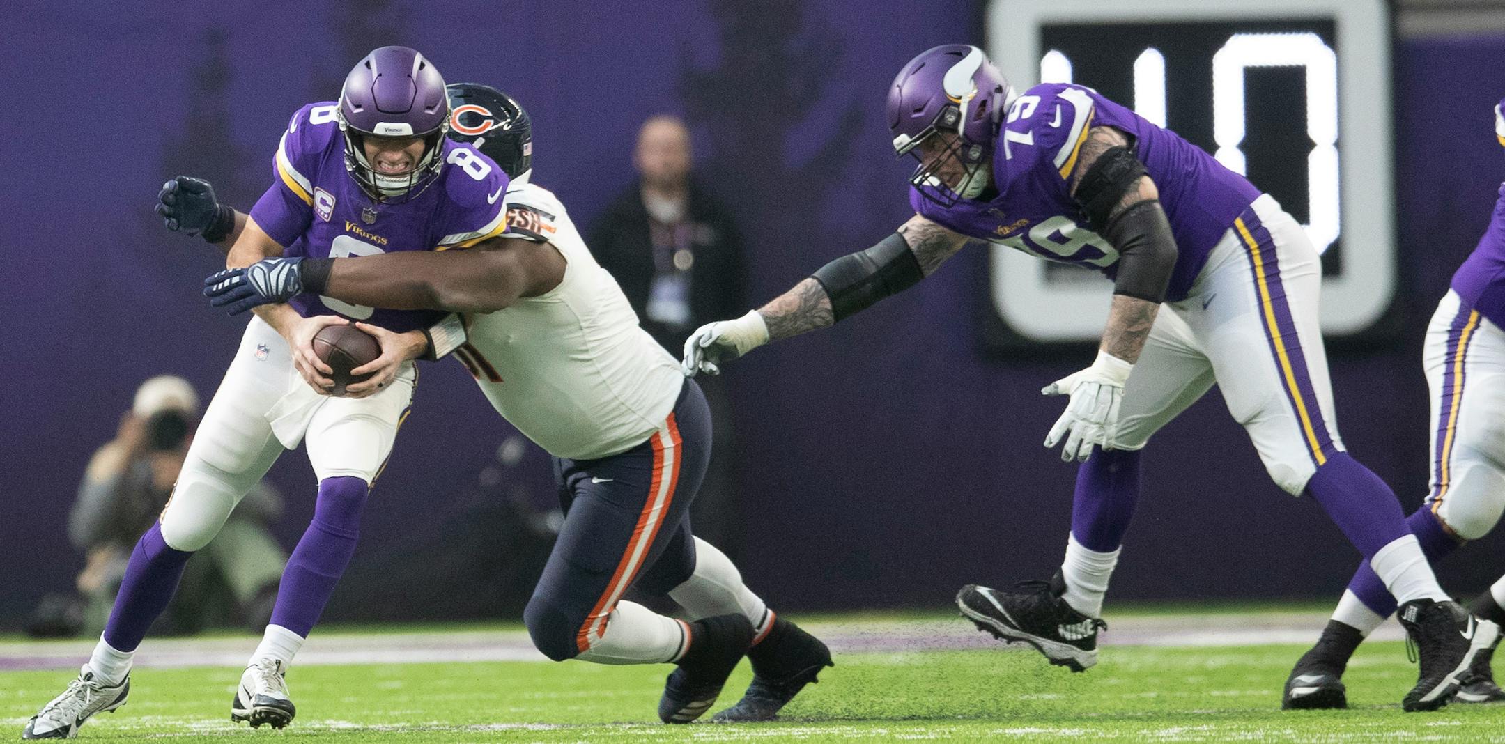 Upgrade on the line, please: Vikings quarterback Kirk Cousins was sacked for 6-yard loss by Chicago nose tackle Eddie Goldman last December.