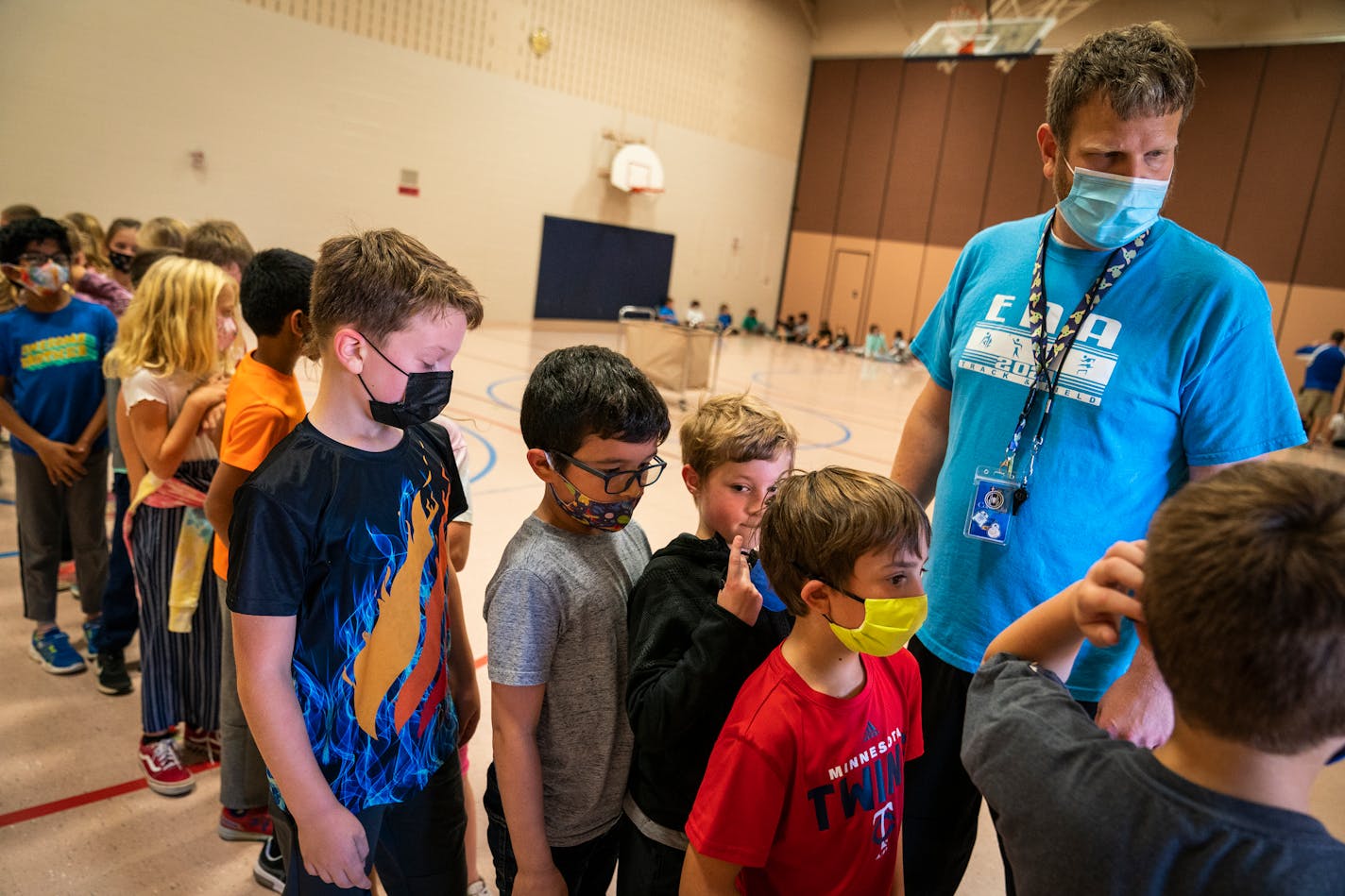 Craig Nilles substitute teaches a physical education class at Woodland Elementary School Tuesday, Oct. 26, 2021 in Eagan, Minn. The substitute teacher shortage continued this fall, with districts reporting more need than ever and hundreds fewer candidates to step up when teachers are ill or need the day off. ] LEILA NAVIDI • leila.navidi@startribune.com