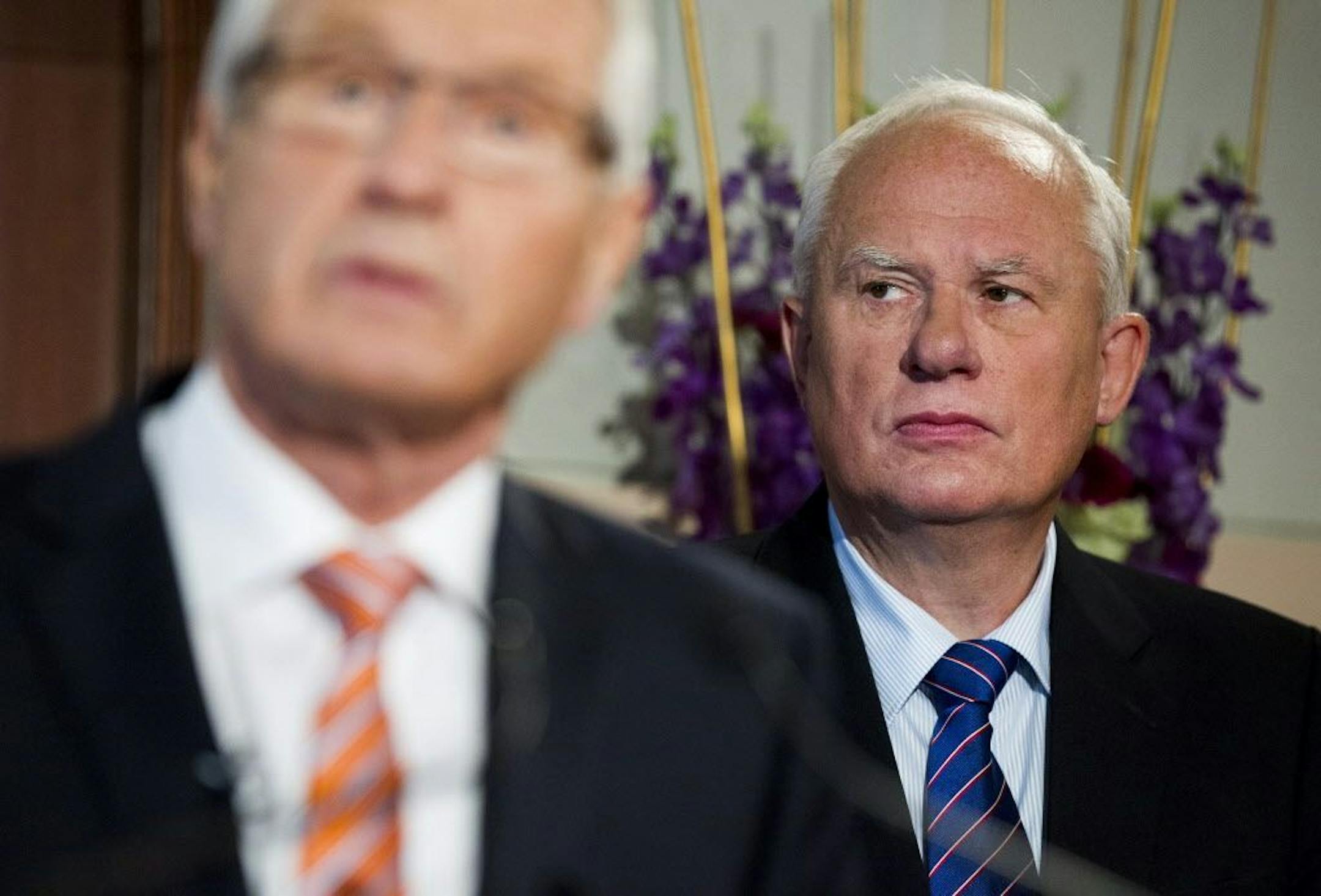 FILE - This is an Oct. 10, 2014 file photo of Geir Lundestad, right, the then secretary of the Norwegian Nobel Committee, stands behind Thorbjorn Jagland, chairman of the Nobel Committee, during the announcement for the 2014 Nobel Peace Prize.