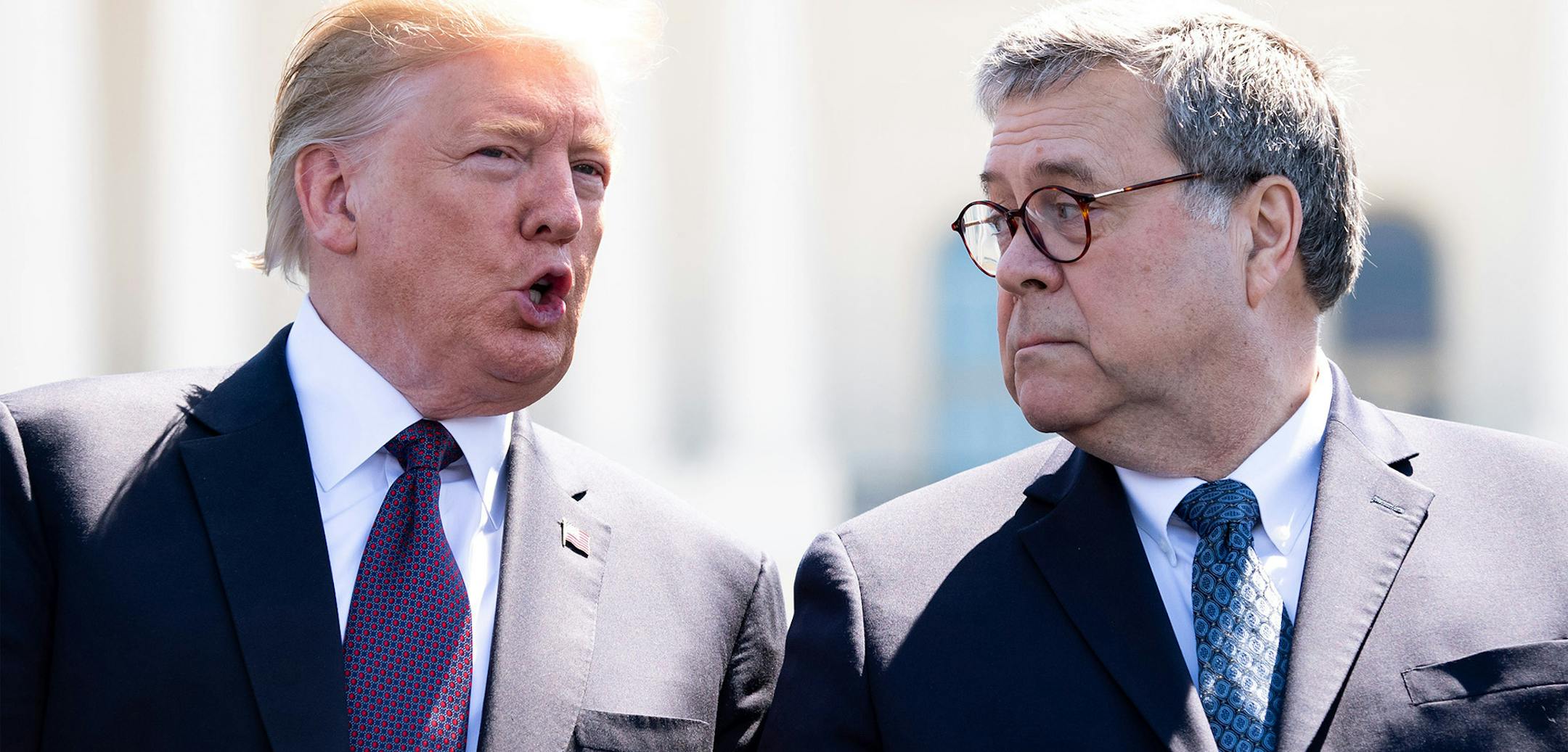 President Donald Trump, left, talks to Attorney General William Barr during the 38th annual National Peace Officers' Memorial Service, at the U.S. Capitol in Washington, D.C., on May 15, 2019. (Kevin Dietsch/Sipa USA/TNS) ORG XMIT: 1319244