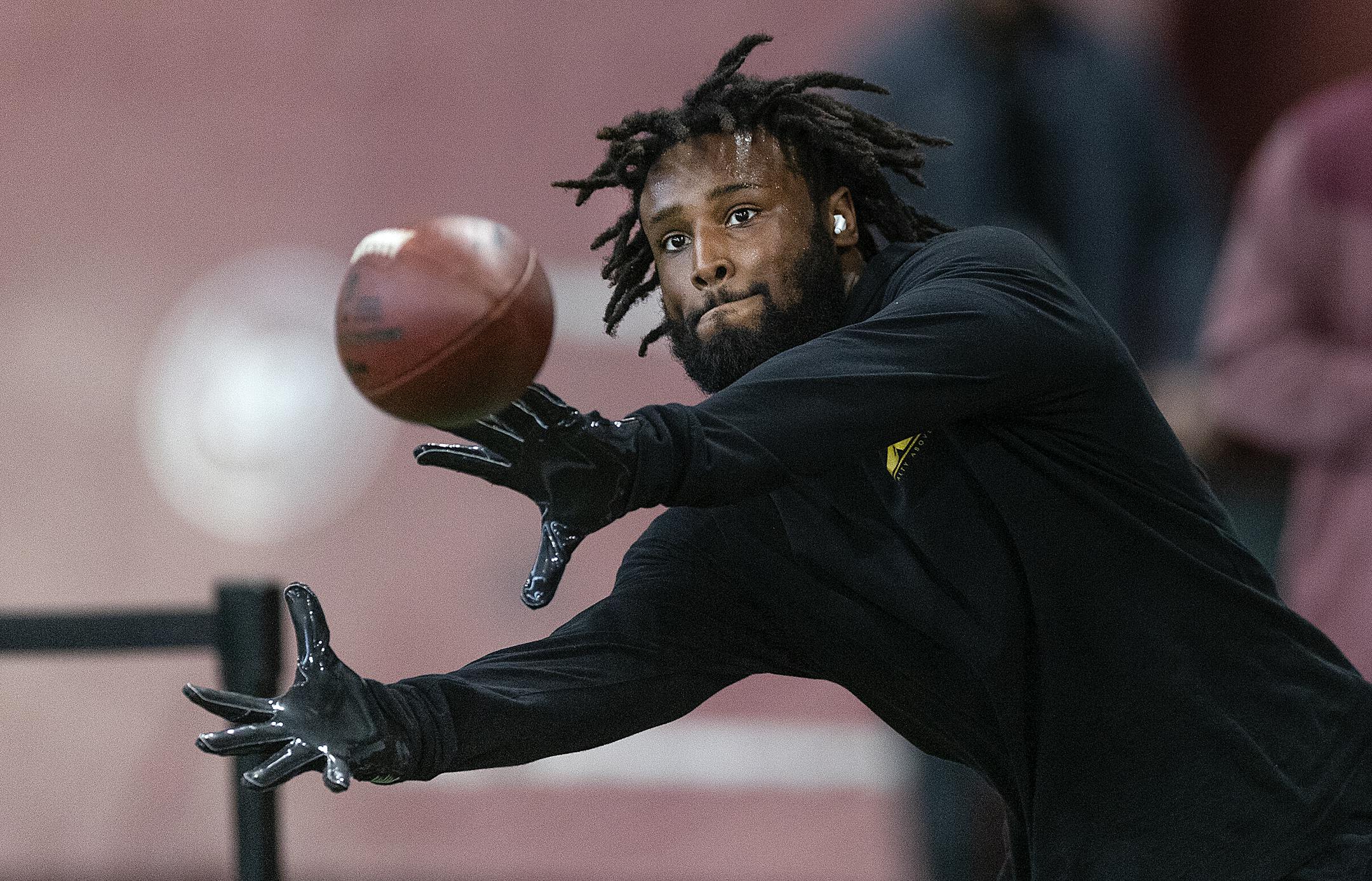 Minnesota Running back Mohamed Ibrahim makes some catches during the Minnesota Pro Day.