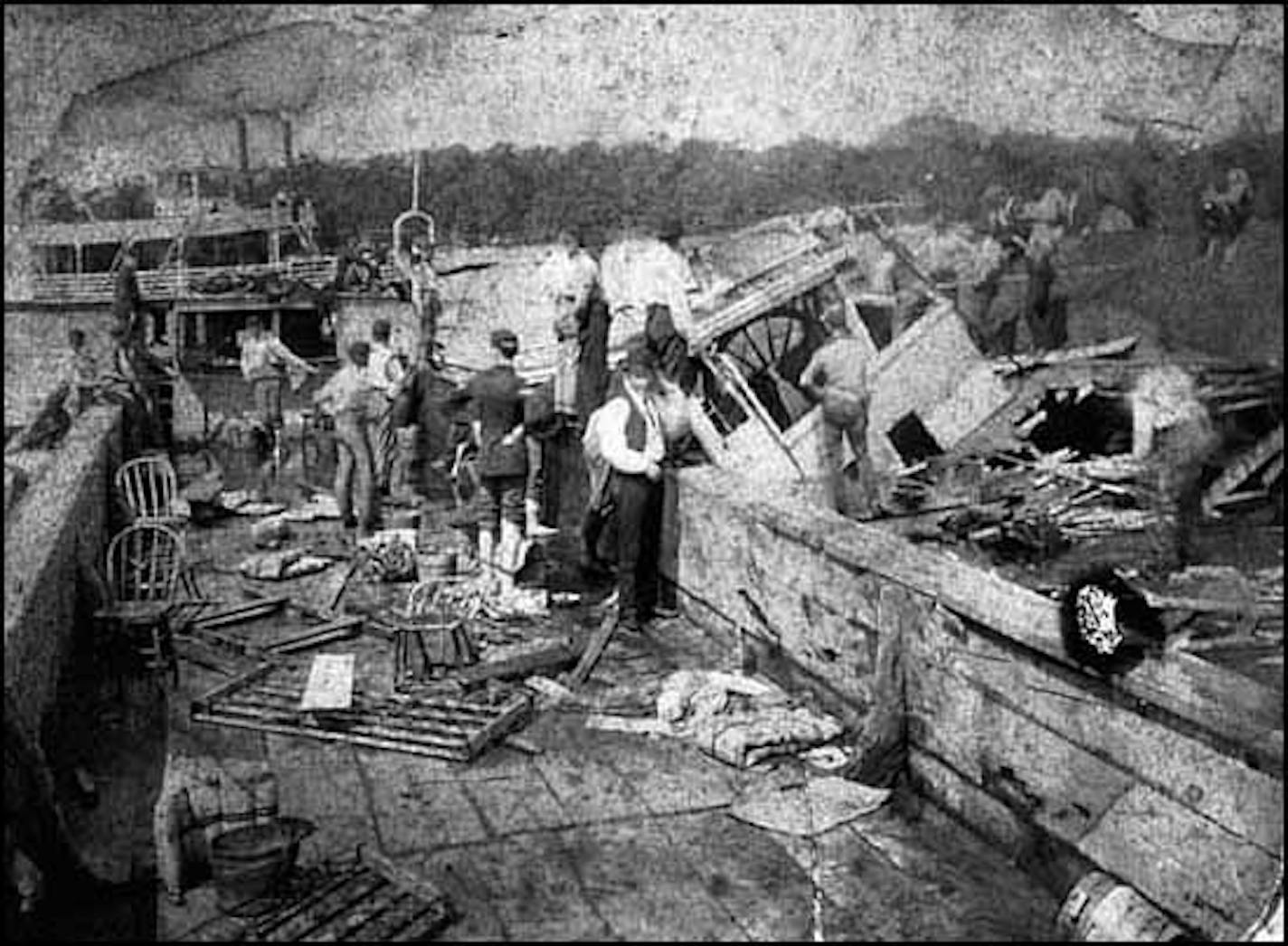 National Guard members survey the wreckage of the Sea Wing. (mnhs.org photo)