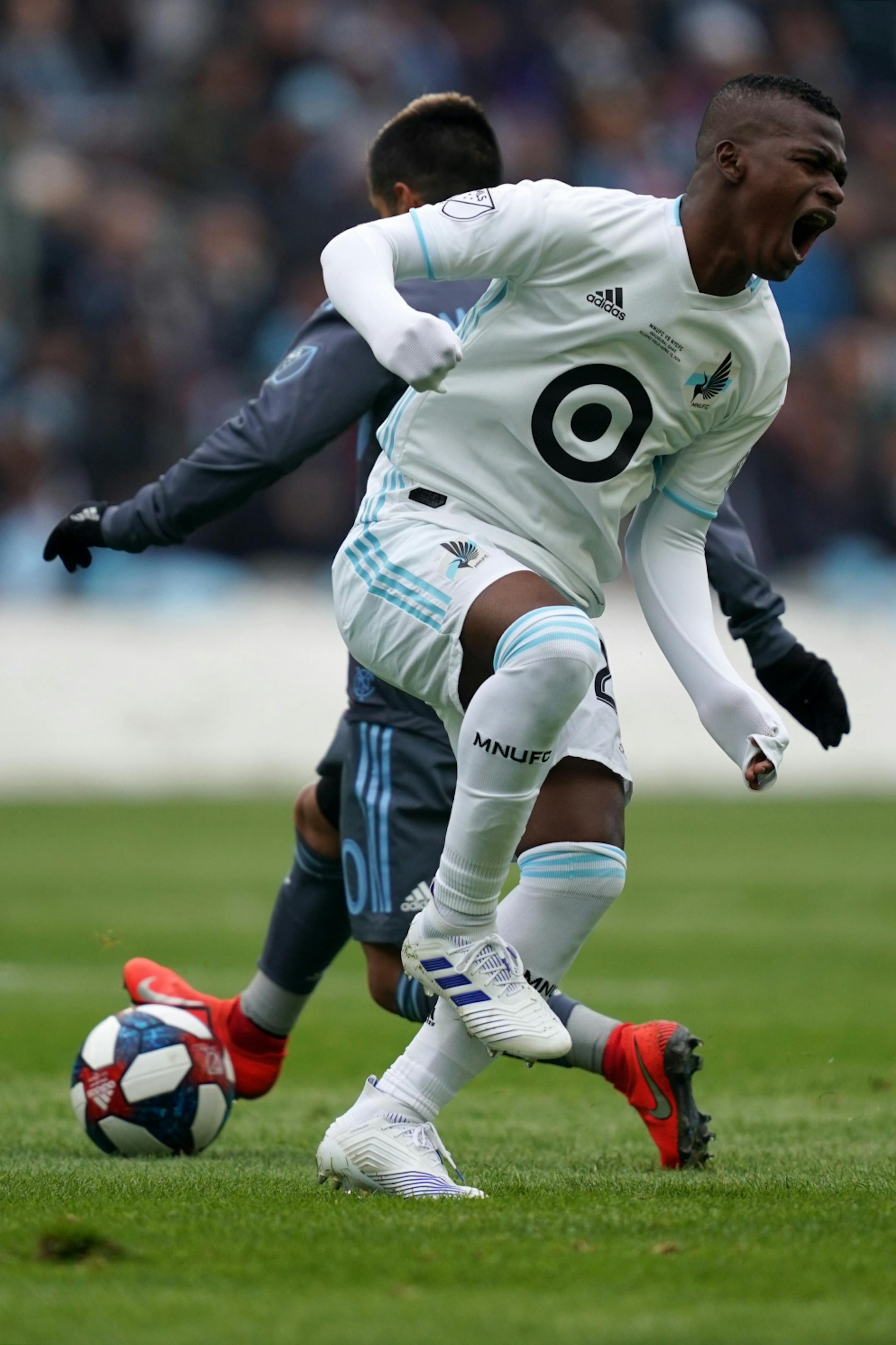 Minnesota United forward Carlos Darwin Quintero (25) reacted after colliding with New York City midfielder Maximiliano Moralez (10) in the first half.