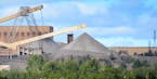 This photo taken Aug. 26, 2014, shows the Minntac taconite mine plant in Mountain Iron, Minn. U.S. Steel plans to idle part of its Minntac plant in Mo