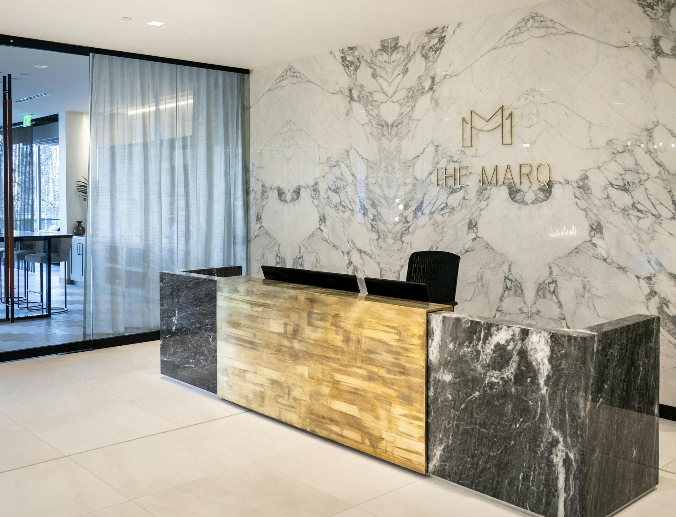 The front lobby at The Marq in Minneapolis, Minn., on Monday, March 25, 2019. The former home of the Federal Reserve that many people know for its "smile" glass facade has underwent a $7 million renovation and is now called The Marq. ] RENEE JONES SCHNEIDER ¥ renee.jones@startribune.com