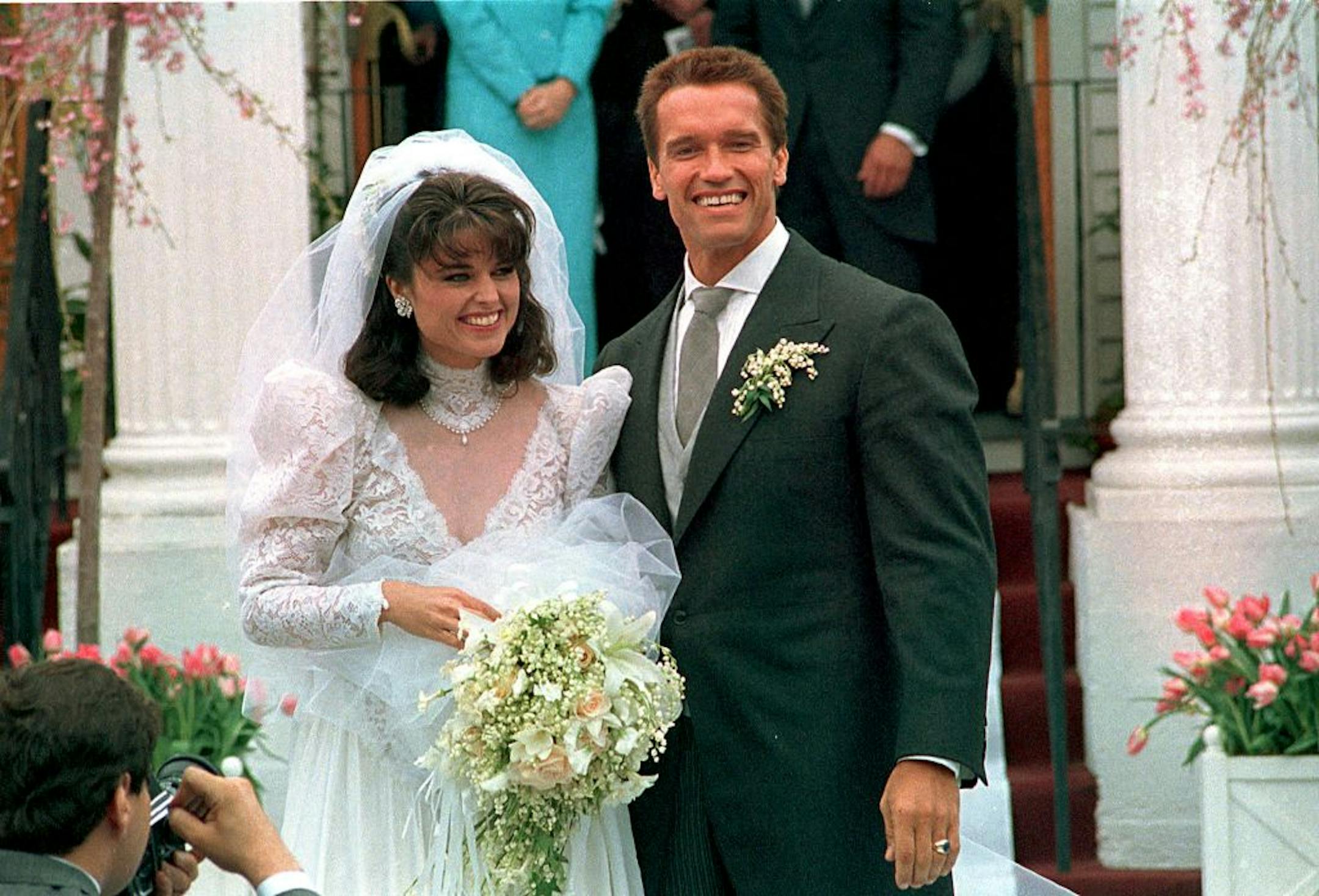 FILE -- In an April 25, 1986 file photo Actor Arnold Schwarzenegger poses with his bride Maria Shriver following their wedding ceremony in Hyannis, Mass. Former California Gov. Arnold Schwarzenegger and his wife of 25 years, Maria Shriver, announced Monday May 9, 2011, that they are separating.