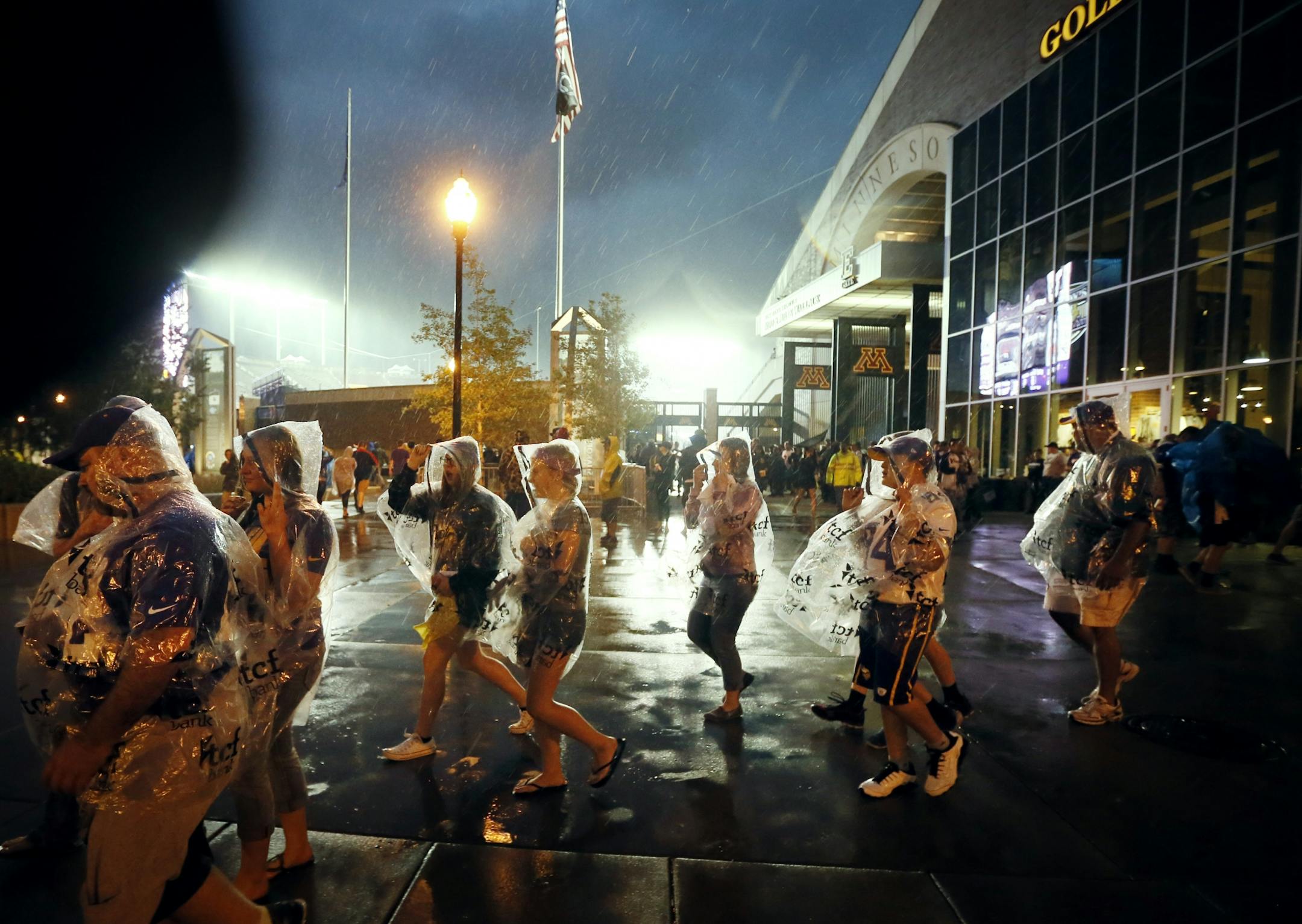 Vikings fans were evacuated in the second quarter from TCF Bank Stadium due to lighting and heavy rains. The Minnesota Vikings hosted the Oakland Raiders at TCF Bank Stadium Saturday August 22, 2015 in Minneapolis, MN.